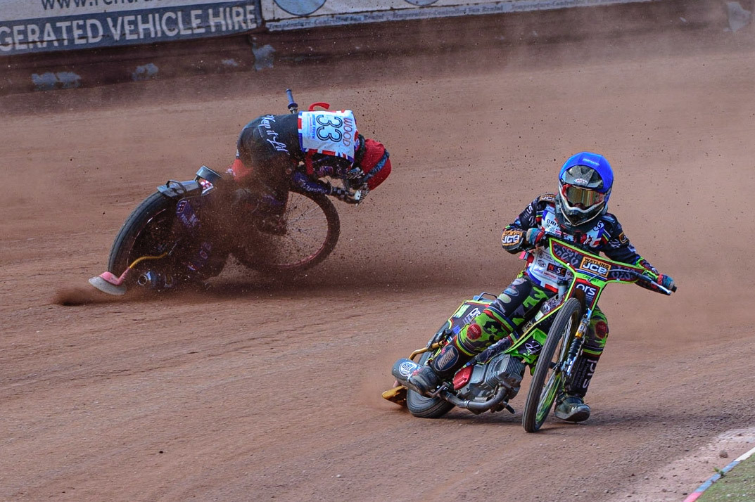 MANCHESTER, UK. JUN 3RD Charlie Wood (33) (Red) crashes behind William Cairns (145)  (Blue) during the British Youth Speedway Championship (Round 4)  at the National Speedway Stadium, Manchester on Friday 3rd June 2022. (Credit: Ian Charles | MI News)
