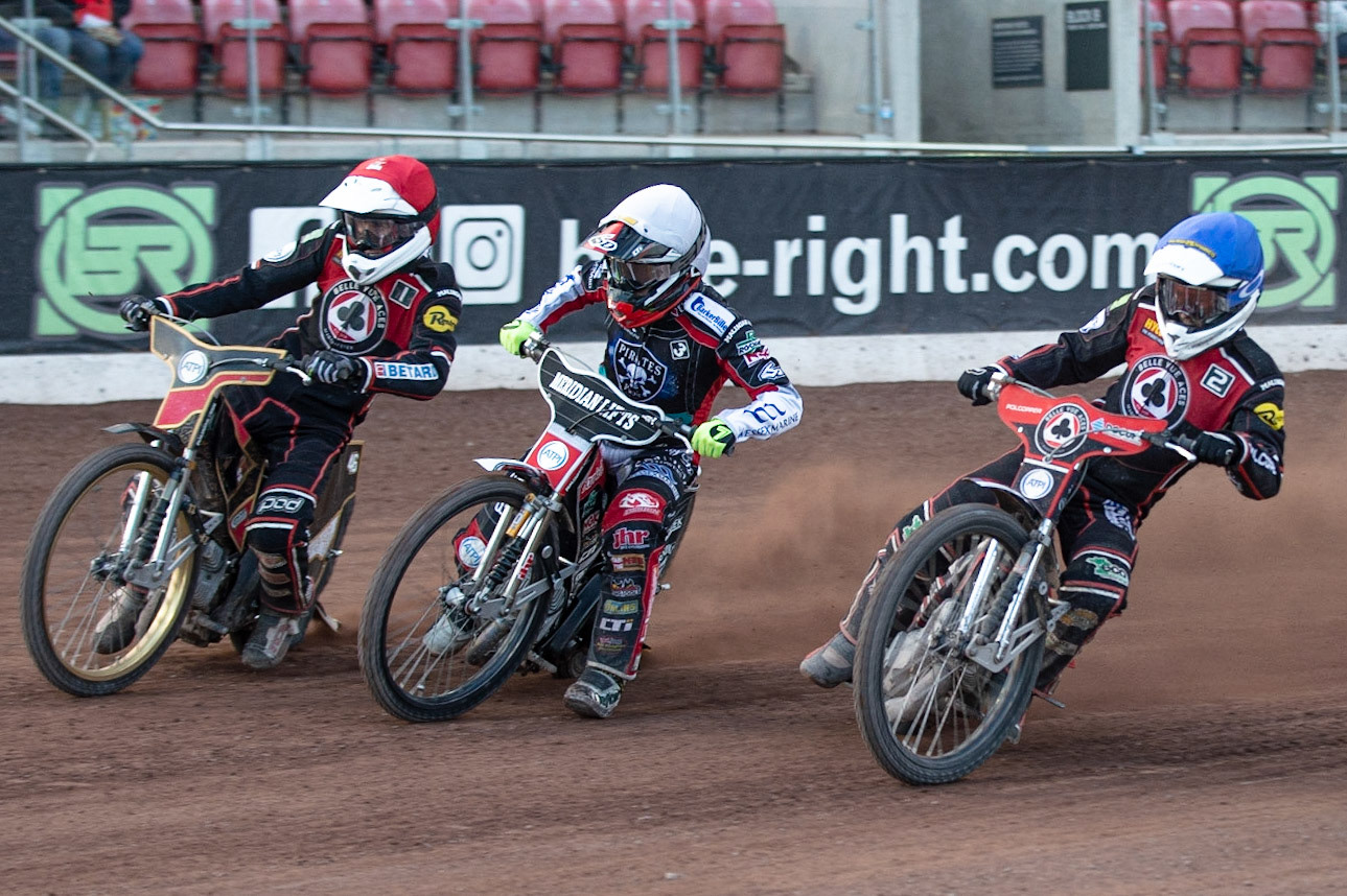 Photo by Ian Charles

Nicolai Klindt  (White) splits Max Fricke  (Red) and Jaimon Lidsey  (Blue)

Belle Vue Aces v Poole Pirates, British Speedway Premiership, Belle Vue National Speedway Stadium, Manchester, Monday 1  July  2019