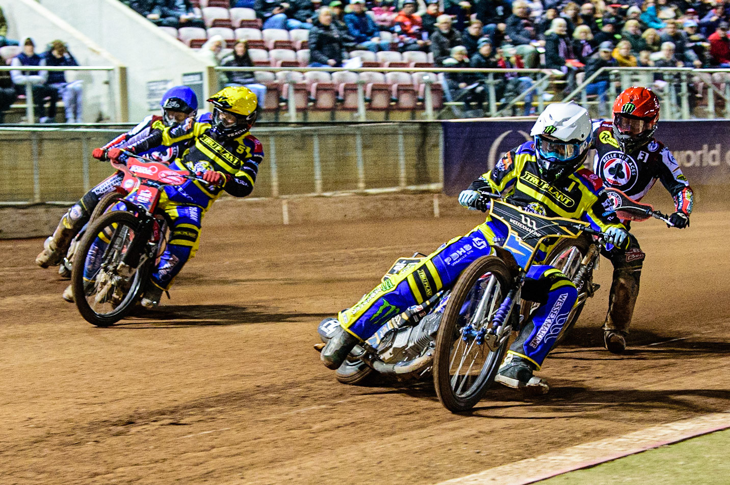 Jack Holder  (White) and Tobiasz Musielak  (Yellow) lead Jaimon Lidsey  (Red) and Brady Kurtz  (Blue) during the SGB Premiership match between Belle Vue Aces and Sheffield Tigers at the National Speedway Stadium, Manchester on Monday 27th March 2023. (Photo: Ian Charles | MI News)