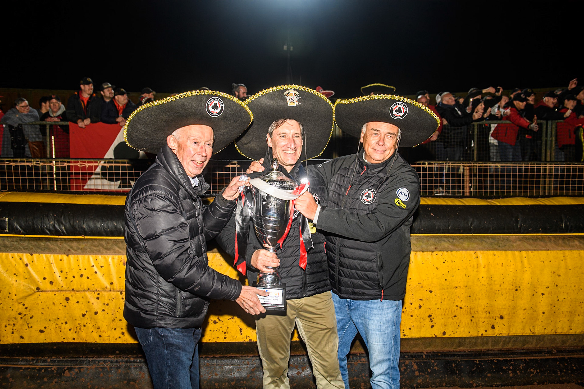 (L to R) Tony Rice, Mark Lemon and Robin Southwell with the Premiership Trophy during the Rowe Motor Oil Premiership Grand Final 2nd Leg between Leicester Lions and Belle Vue Aces at the Pidcock Motorcycles Arena, Leicester on Thursday 26th September 2024. (Photo: Ian Charles | MI News)