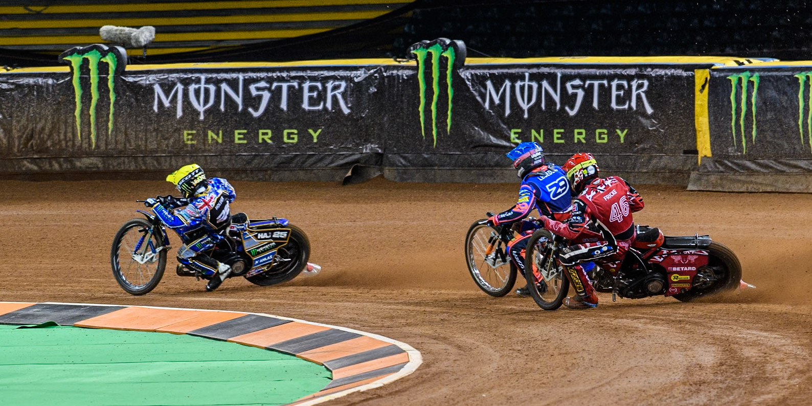 Andzejs Lebedevs (29) of Latvia in Yellow leading Andzejs Lebedevs (29) of Latvia in Blue and Max Fricke (46) of Australia in Red during the FIM Speedway Grand Prix of Great Britain at The Principality Stadium, Cardiff on Saturday 17th August 2024. (Photo: Ian Charles | MI News)
