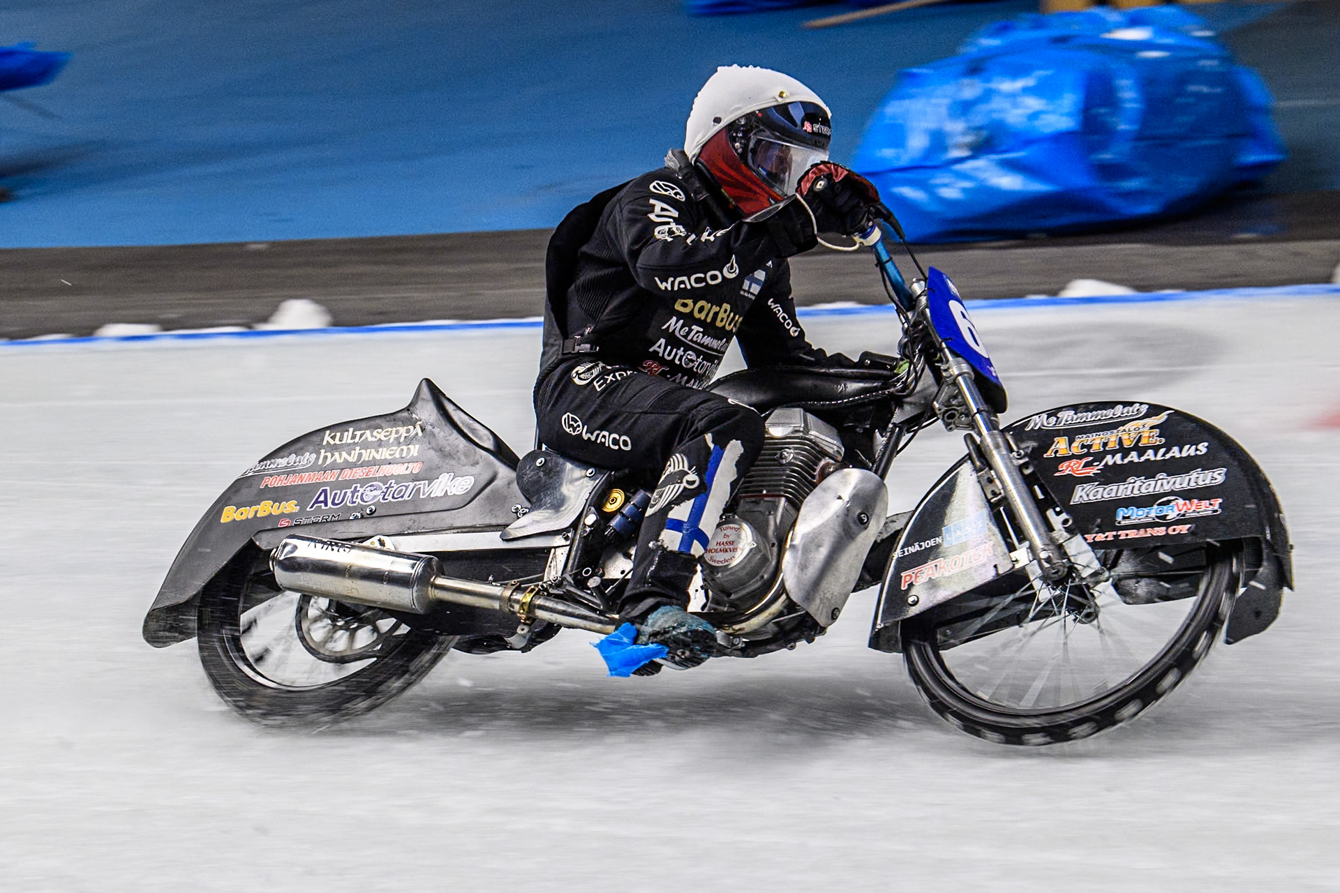 Aki Ala-Riihimäki (66) of Finland in action however he was disqualified after this heat for touching the bales as he has some of the blue polythene bale covering on his foot, during the Ice Speedway Gladiators World Championship Final 1 at Max-Aicher-Arena, Inzell on Saturday 15th March 2025. (Photo: Ian Charles | MI News)