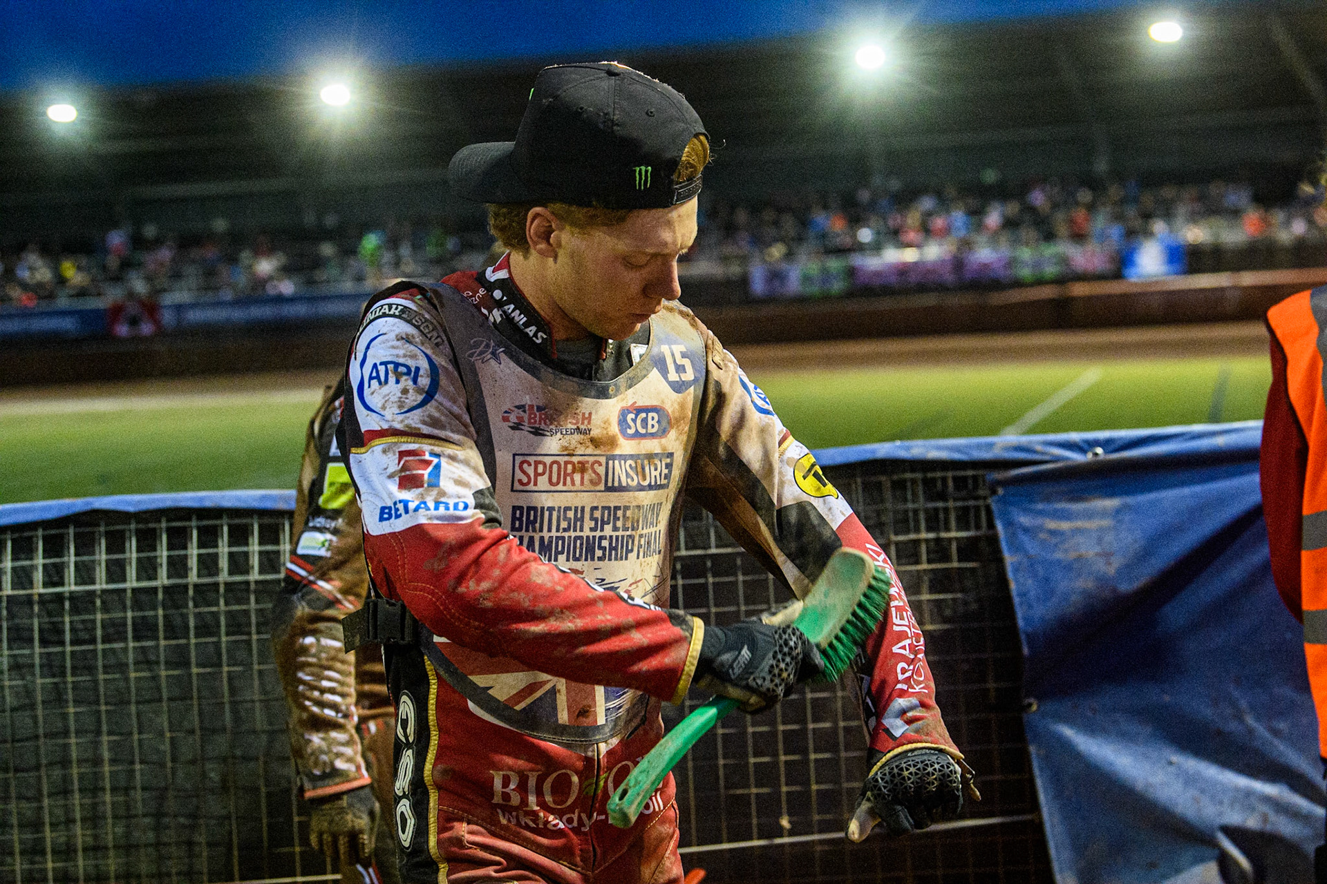 Dan Bewley cleans off the mud from his kevlars during the Sports Insure British Speedway Final at the National Speedway Stadium, Manchester on Monday 14th August 2023. (Photo: Ian Charles | MI News)
