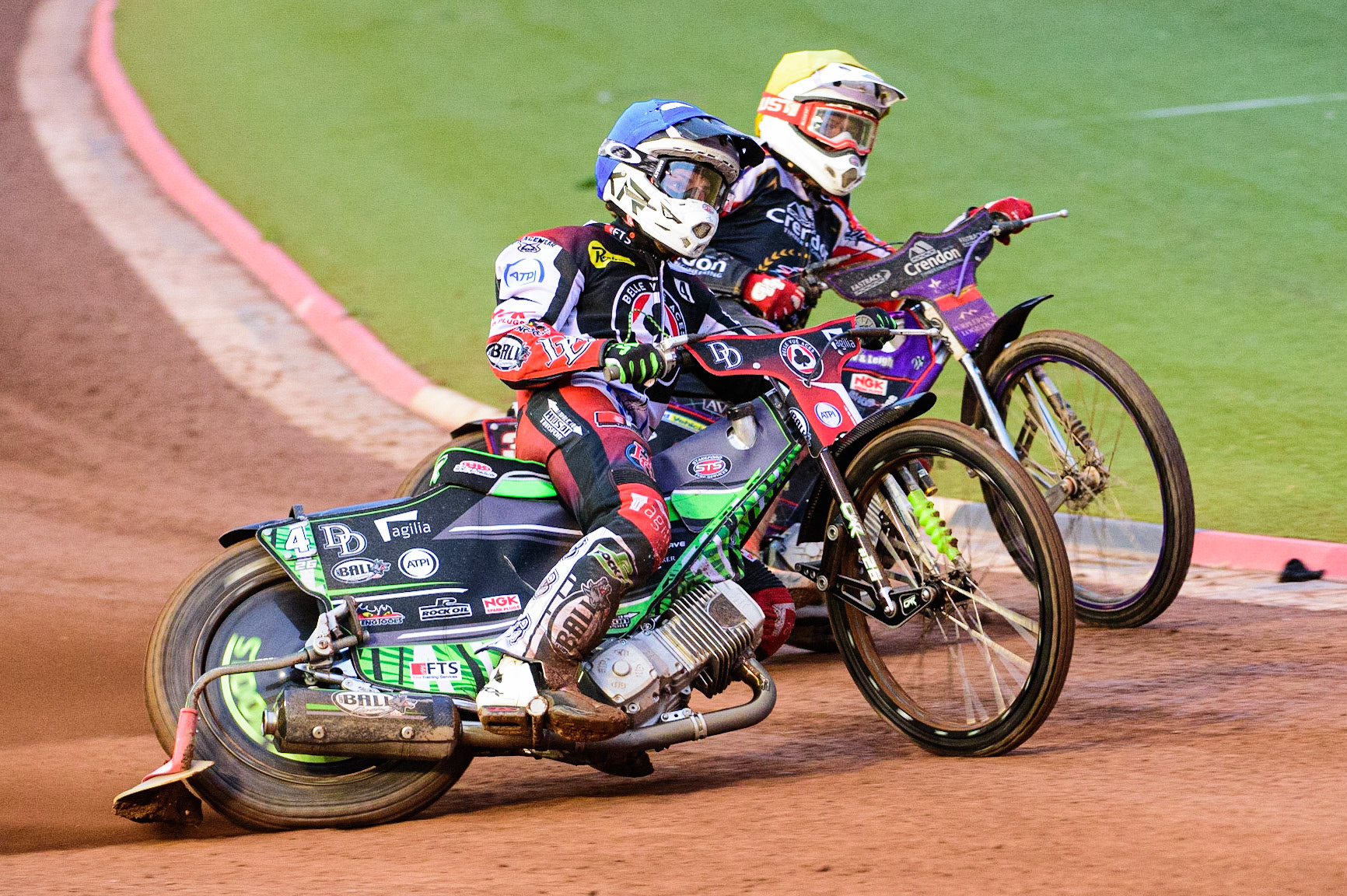 Charles Wright (Blue) outside Ulrich Oostergaard  (Yellow) during the SGB Premiership match between Belle Vue Aces and Peterborough at the National Speedway Stadium, Manchester on Monday 25th July 2022. (Credit: Ian Charles | MI News