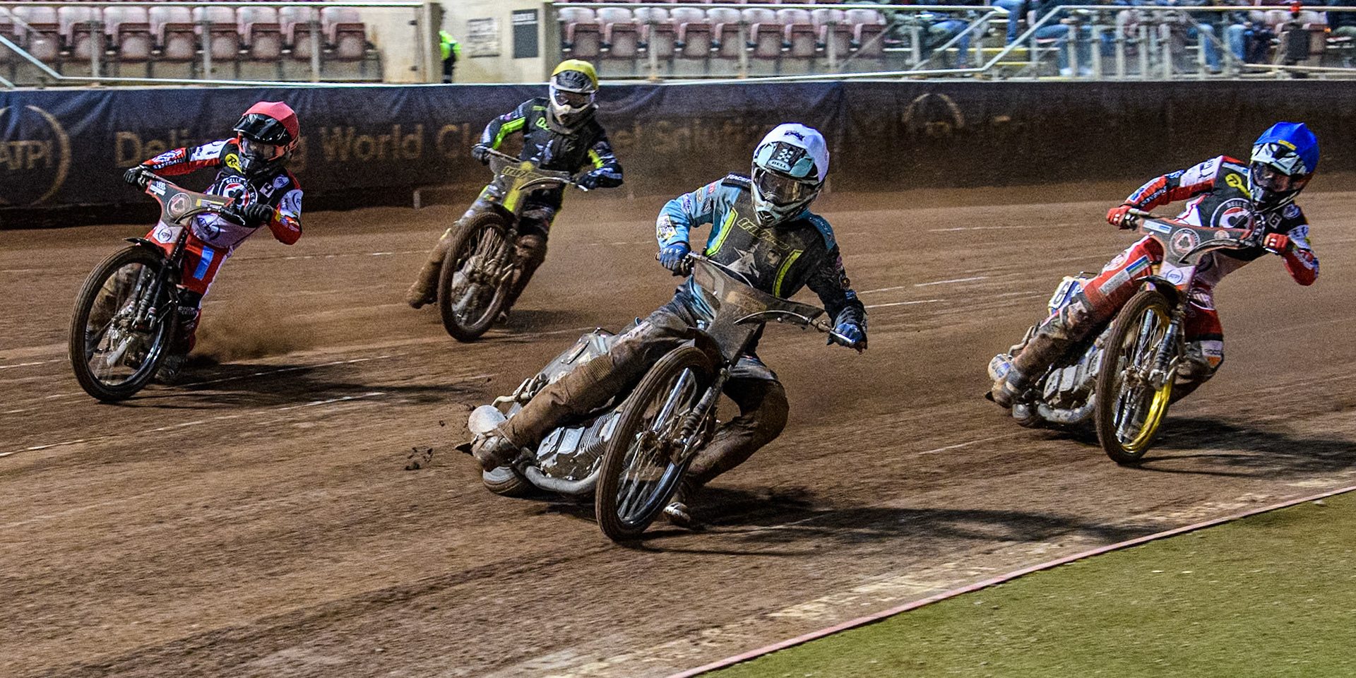 Ipswich Witches' Guest Ryan Douglas in White leading Belle Vue Aces' Ben Cook in Red, Ipswich Witches' Dan Thompson in Yellow and Belle Vue Aces' Connor Mountain in Blue  during the Rowe Motor Oil Premiership match between Belle Vue Aces and Ipswich Witches at the National Speedway Stadium, Manchester on Monday 22nd April 2024. (Photo: Ian Charles | MI News)