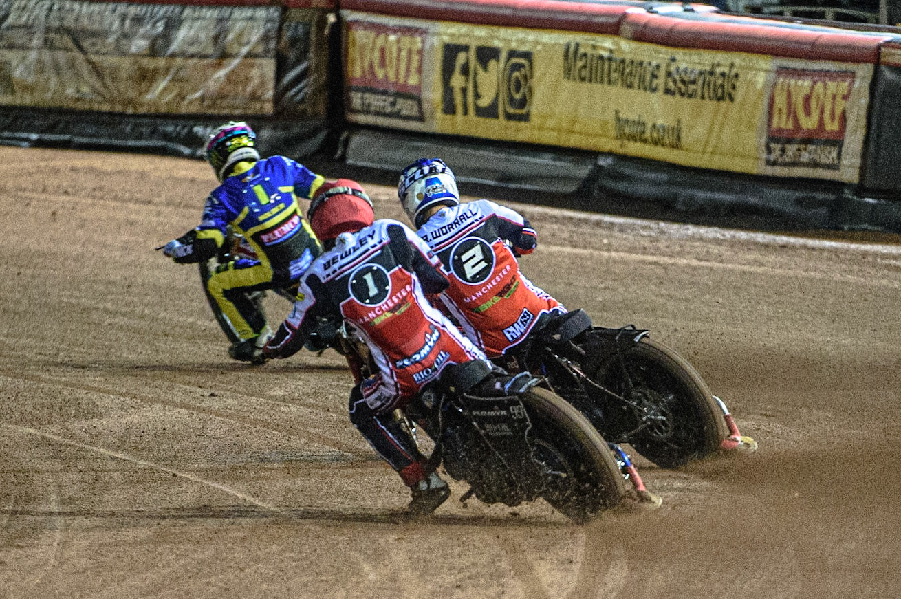MANCHESTER, UK. OCT 7TH  Dan Bewley (Red) chases Richie Worrall  (Blue) and Jack Holder (White) during the SGB Premiership Play off Semi-Final Second Leg between Belle Vue Aces and Sheffield Tigers at the National Speedway Stadium, Manchester on Thursday 7th October 2021. (Credit: Ian Charles | MI News)