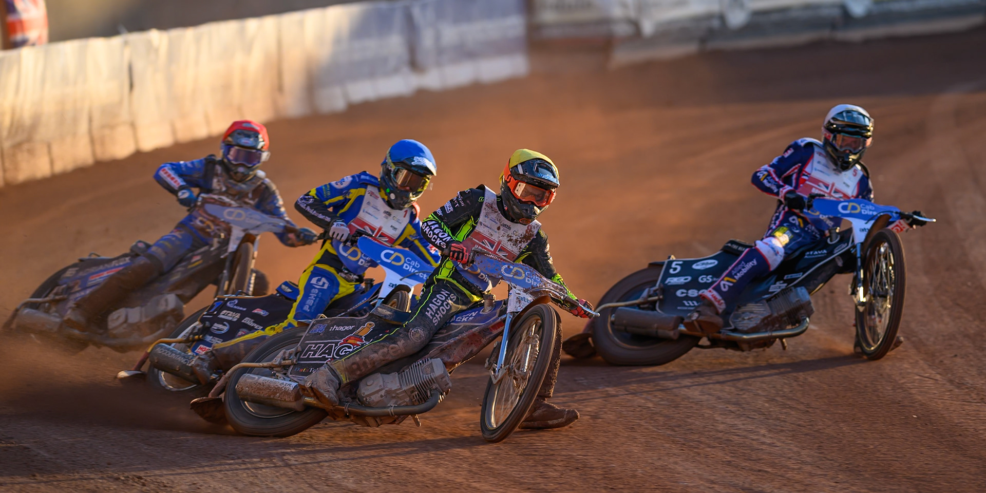 Jason Edwards (9) in Yellow on the outside of Adam Ellis (5) \in White  with Anders Rowe (1) in Blue  and Jody Scott (13) in Red  behind during the Cab Direct British Speedway Championship Final at the National Speedway Stadium, Manchester on Saturday 15th August 2026. (Photo: Ian Charles | MI News)