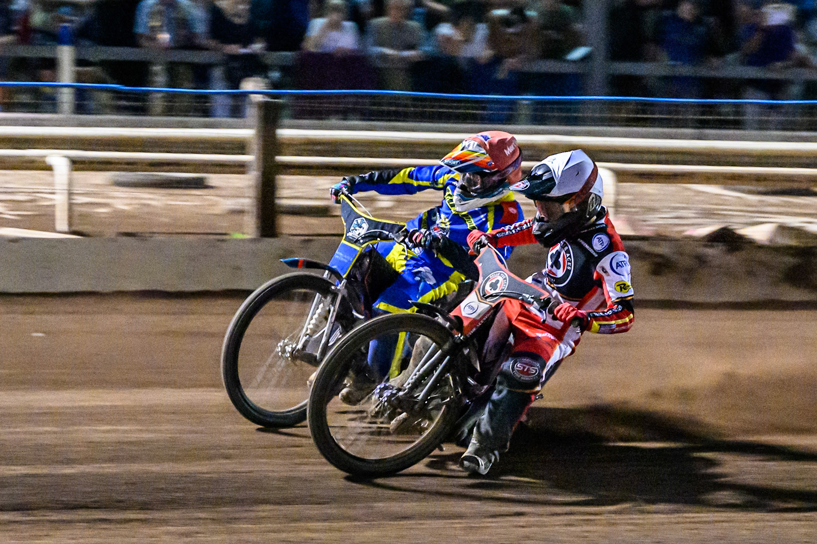 Zach Cook of Belle Vue Aces  in White battles with Nick Morris of Sheffield Tigers  in Red during the Rowe Motor Oil Premiership match between Sheffield Tigers and Belle Vue Aces at Owlerton Stadium, Sheffield on Monday 11th August 2025. (Photo: Ian Charles | MI News)