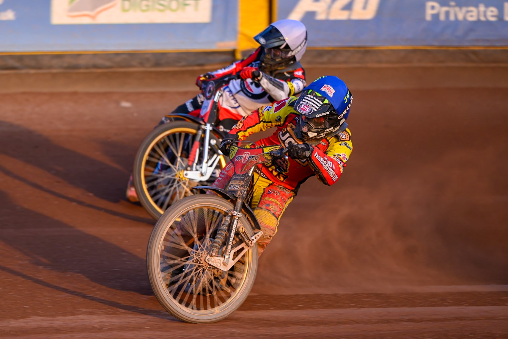Joe Thompson of Leicester Lions in Blue rides inside Norick Blodorn of Belle Vue Aces  in White during the Rowe Motor Oil Premiership match between Leicester Lions and Belle Vue Aces at the Hydroscan Arena, Leicester on Thursday 23rd July 2026. (Photo: Ian Charles | MI News)