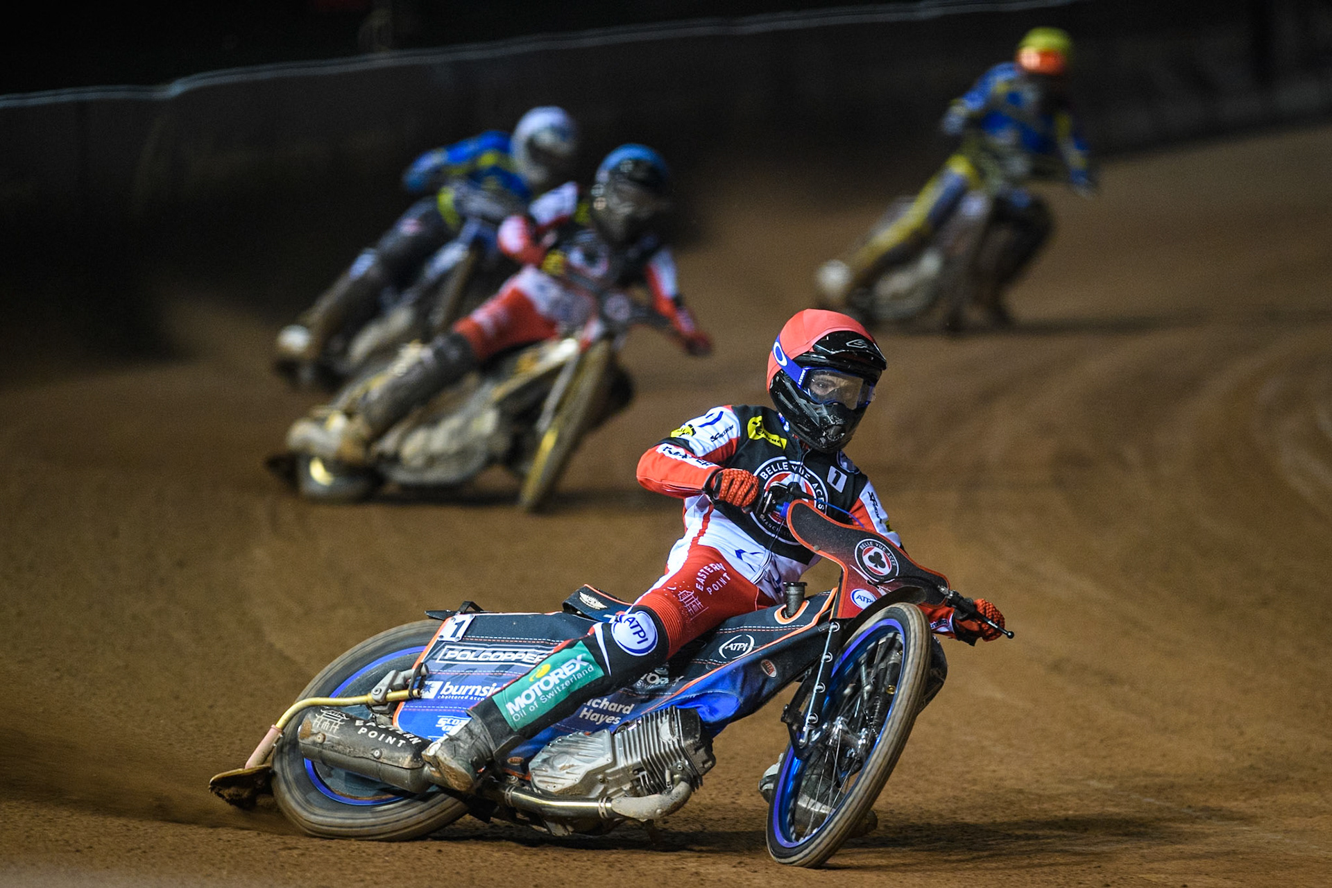 Belle Vue Aces' Brady Kurtz  in Red leading Belle Vue Aces' Norick Blodorn  in Blue, Sheffield Tigers' Guest Rider Chris Harris  in White and Sheffield Tigers' Jason Edwards  in Yellow during the Rowe Motor Oil Premiership Play Off Semi Final 2, 1st Leg match between Belle Vue Aces and Sheffield Tigers at the National Speedway Stadium, Manchester on Monday 16th September 2024. (Photo: Ian Charles | MI News)