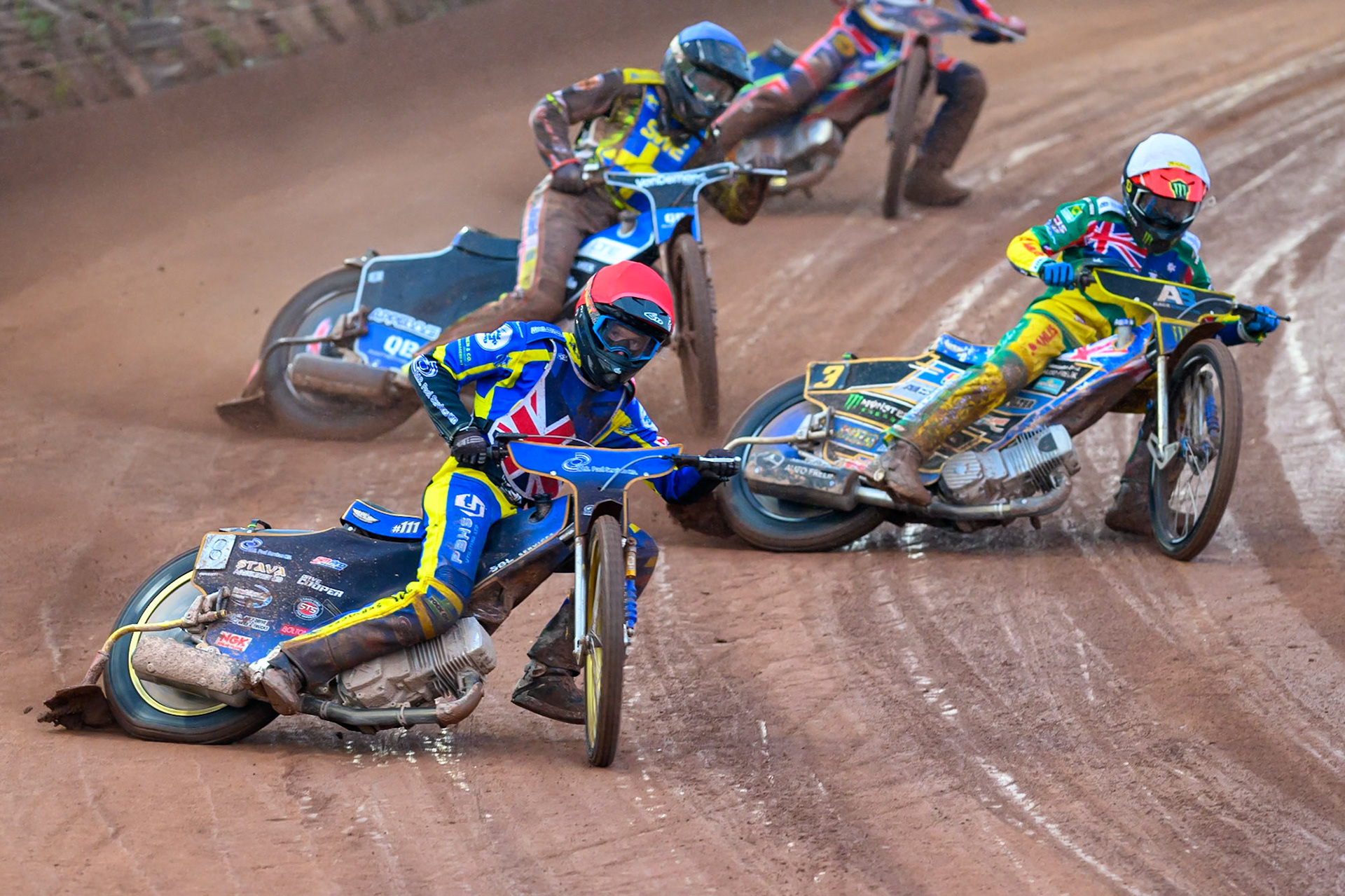 Anders Rowe of Great Britain in Red leading Jack Holder of Australia in White and Casper Henriksson of Sweden in Blue during the Speedway GP Qualifying Round 3 at Allied Ashfield Stadium, Glasgow on Saturday 30th May 2026. (Photo: Ian Charles | MI News)