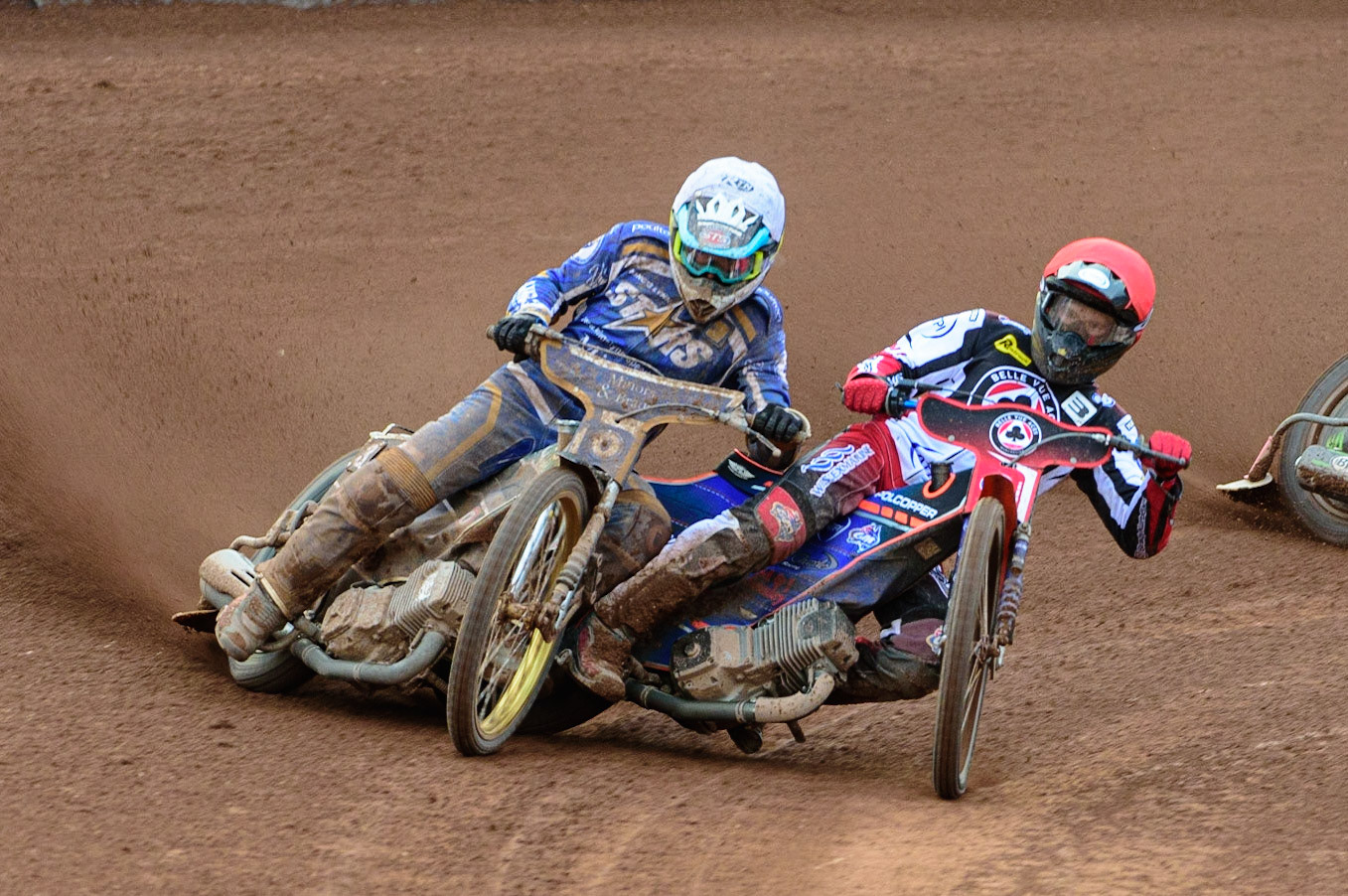 MANCHESTER UK Brady Kurtz  (Red) shoves Richard Lawson (White) out of the way  during the SGB Premiership match between Belle Vue Aces and King's Lynn Stars at the National Speedway Stadium, Manchester on Monday 11th July 2022. (Credit: Ian Charles | MI News)