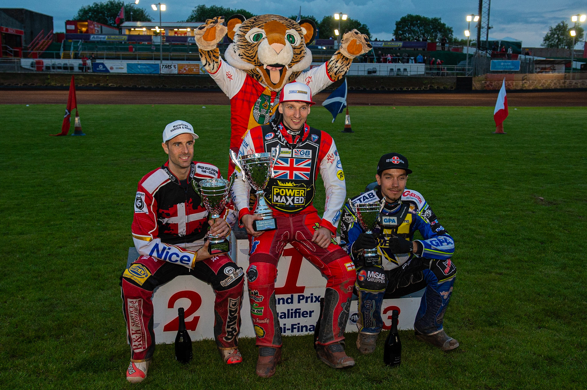 Photo by Ian Charles:

Top 3: Niels-Kristian Iversen (2nd), Craig Cook (1st), Pontus Aspgren (3rd) with Glasgow Mascot Roary (Rear)


FIM Speedway Grand Prix World Championship - Qualifying Round 1, Peugeot Ashfield Stadium, Glasgow, 8 June 2019