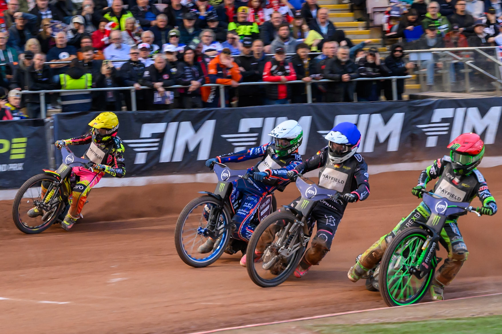 (L to R) Michael Jepsen Jensen (52) of Denmark in Yellow, Brady Kurtz (101) of Australia in White, Kai Huckenbeck (744) of Germany in Blue and Patryk Dudek (692) of Poland in Red during the ATPI  FIM Speedway GP of Manchester at the National Speedway Stadium, Manchester on Saturday 6th June 2026. (Photo: Ian Charles | MI News)