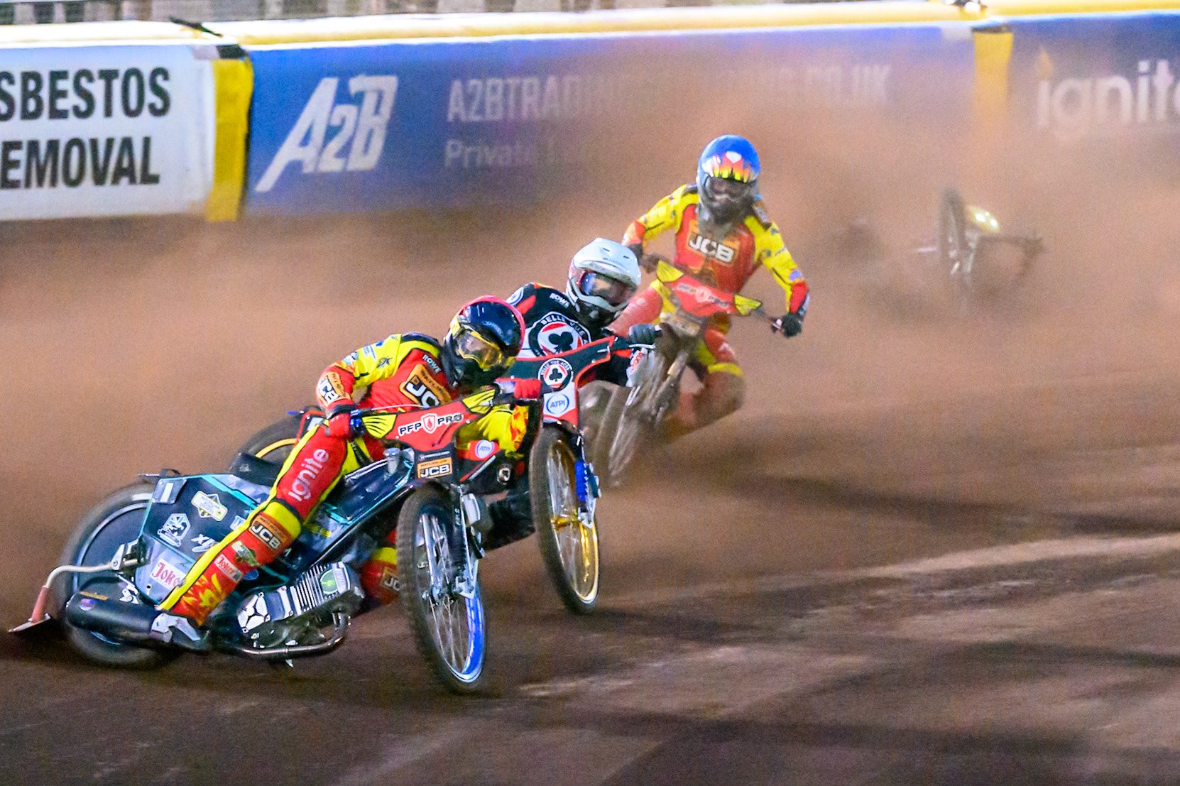 Ryan Douglas of Leicester Lions in Red leading Jason Doyle of Belle Vue Aces  in White  and Drew Kemp of Leicester Lions in Blue  as Tate Zischke of Belle Vue Aces  in Yellow  falls behind them during the Rowe Motor Oil Premiership match between Leicester Lions and Belle Vue Aces at the Hydroscan Arena, Leicester on Monday 7th September 2026. (Photo: Ian Charles | MI News)