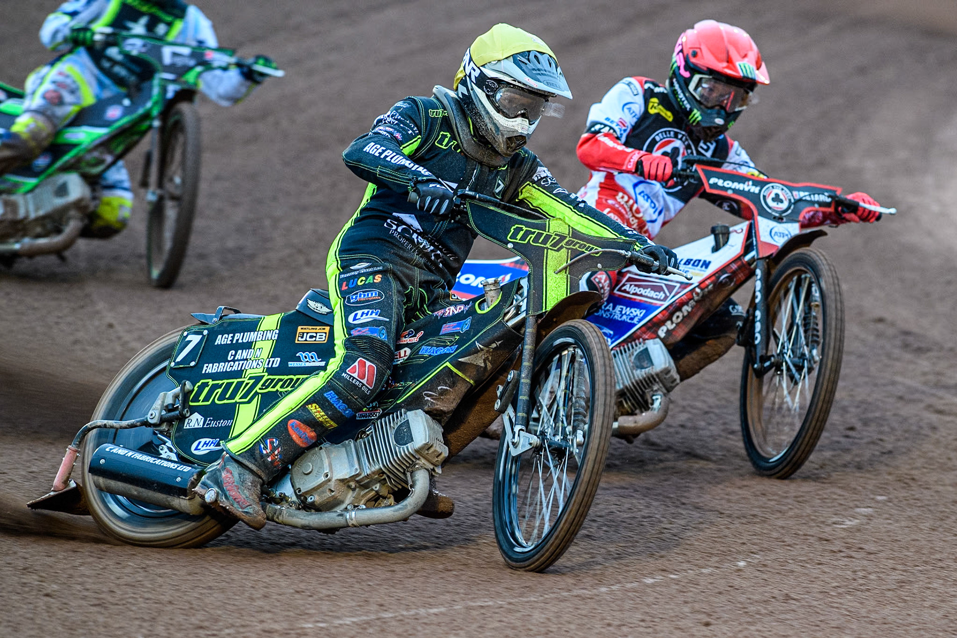Ipswich Witches' Dan Thompson in Yellow rides outside Belle Vue Aces' Dan Bewley in Red during the Rowe Motor Oil Premiership match between Belle Vue Aces and Ipswich Witches at the National Speedway Stadium, Manchester on Monday 22nd April 2024. (Photo: Ian Charles | MI News)