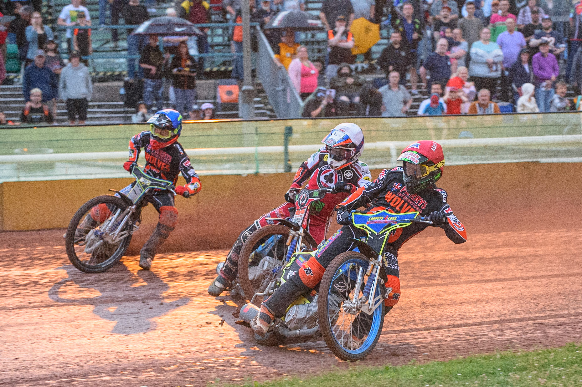 WOLVERHAMPTON, UK. JULY 26TH Nick Morris  (Red) leads Ryan Douglas  (Blue) and Steve Worrall  (White) during the SGB Premiership match between Wolverhampton Wolves and Belle Vue Aces at the Ladbroke Stadium, Wolverhampton on Monday 26th July 2021. (Credit: Ian Charles | MI News)