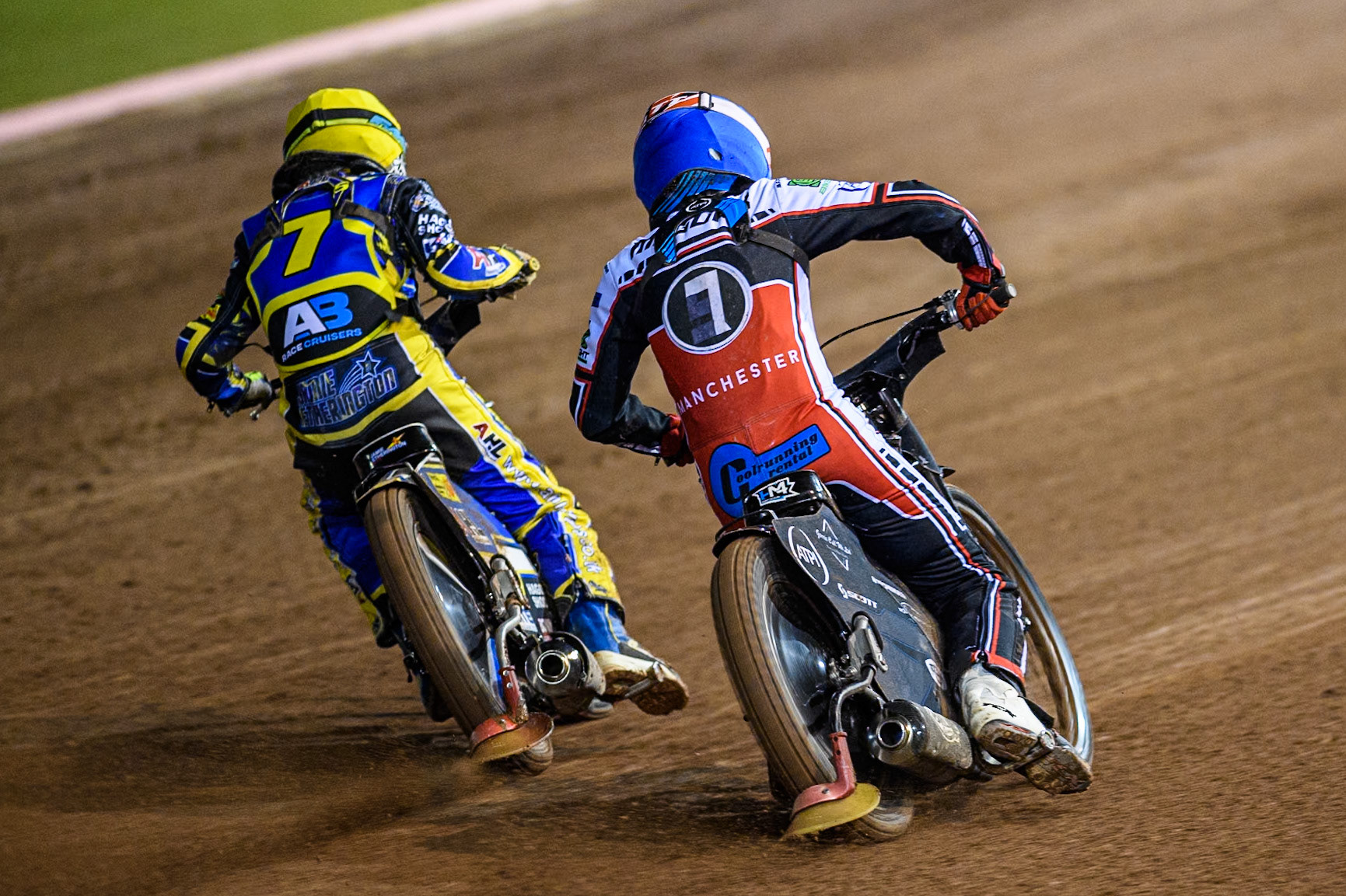 Sheffield Cubs' Jamie Etherington in Yellow passes Belle Vue Colts' Harry McGurk in Blue on the inside during the WSRA National Development League match between Belle Vue Colts and Sheffield Tiger Cubs at the National Speedway Stadium, Manchester on Monday 7th October 2024. (Photo: Ian Charles | MI News)
