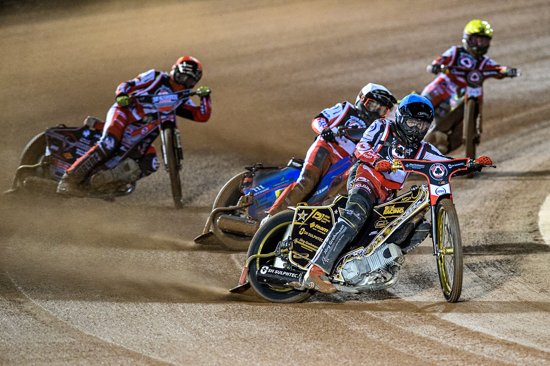 Germany's Norick Blödorn (Blue) leads  Australia's Ben Cook (White), England's Connor Bailey (Red) and Australia's Jaimon Lidsey (Yellow) during the Peter Craven Memorial Trophy meeting at the National Speedway Stadium, Manchester on Monday 18th March 2024. (Photo: Ian Charles | MI News)