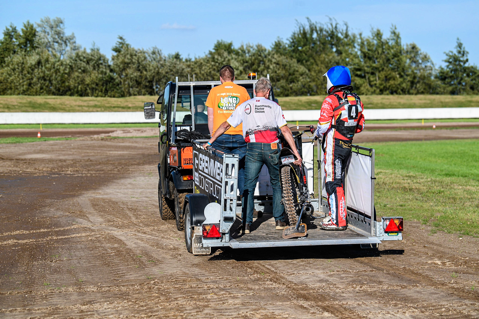 Kenneth K. Hansen gets the lift back to the pits during the FIM Long Track Of Nations event at the Speed Centre Roden on Sunday 24th September 2023. (Photo: Ian Charles | MI News)