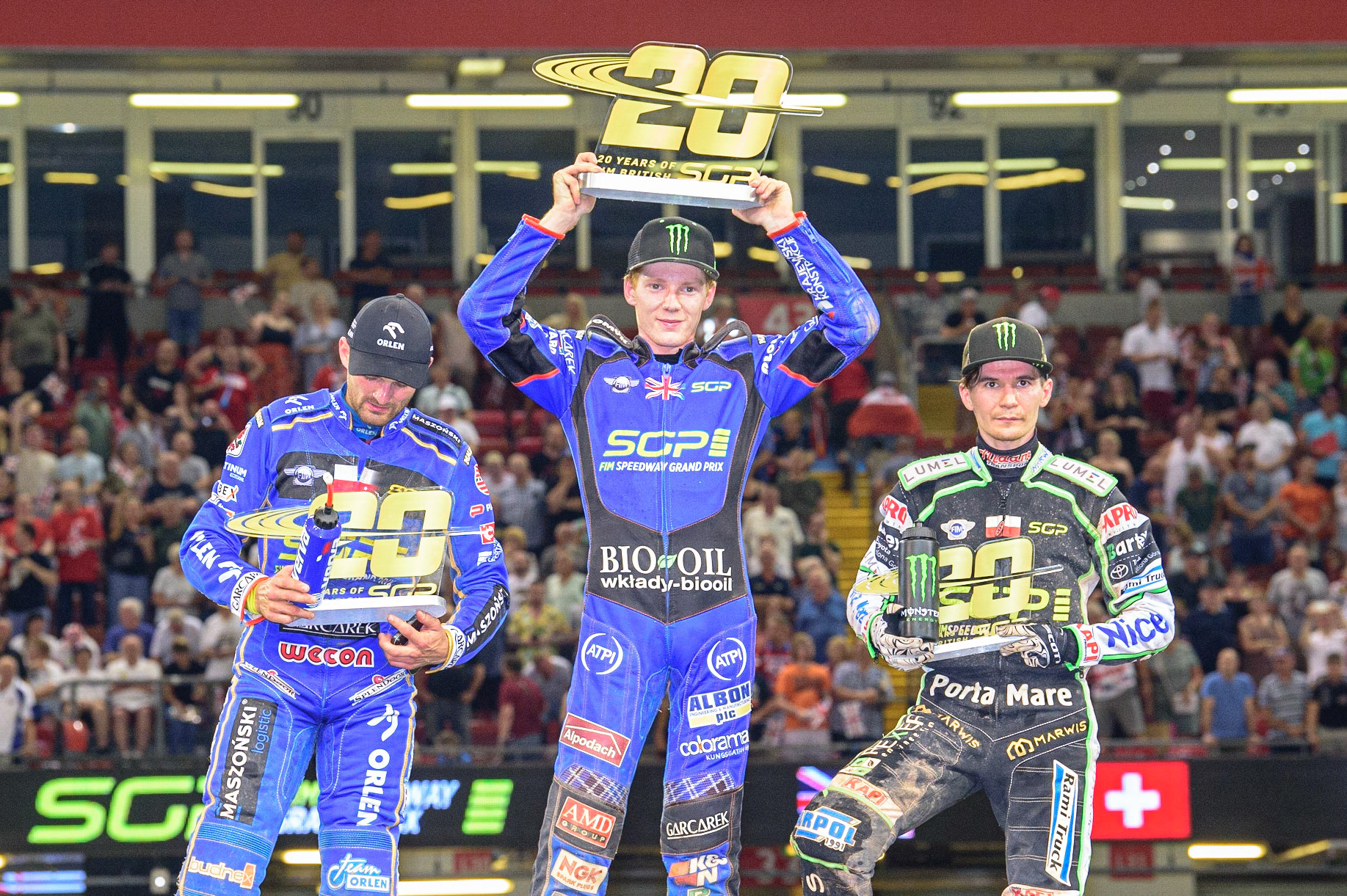 Top 3: (l - r) Bartosz Zmarzlik (95) - 2nd, Dan Bewley (99) Winner and Patryk Dudek (692) - 3rd during the FIM  Speedway Grand Prix of Great Britain at the Principality Stadium, Cardiff on Saturday 13th August 2022. (Credit: Ian Charles | MI News