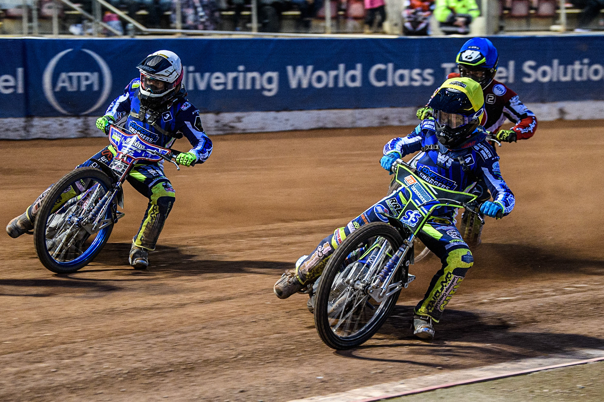 Jody Scott (Yellow) and Henry Atkins  (White) lead Luke Muff  (Blue) during the National Development League match between Belle Vue Colts and Oxford Chargers at the National Speedway Stadium, Manchester on Friday 12th May 2023. (Photo: Ian Charles | MI News)