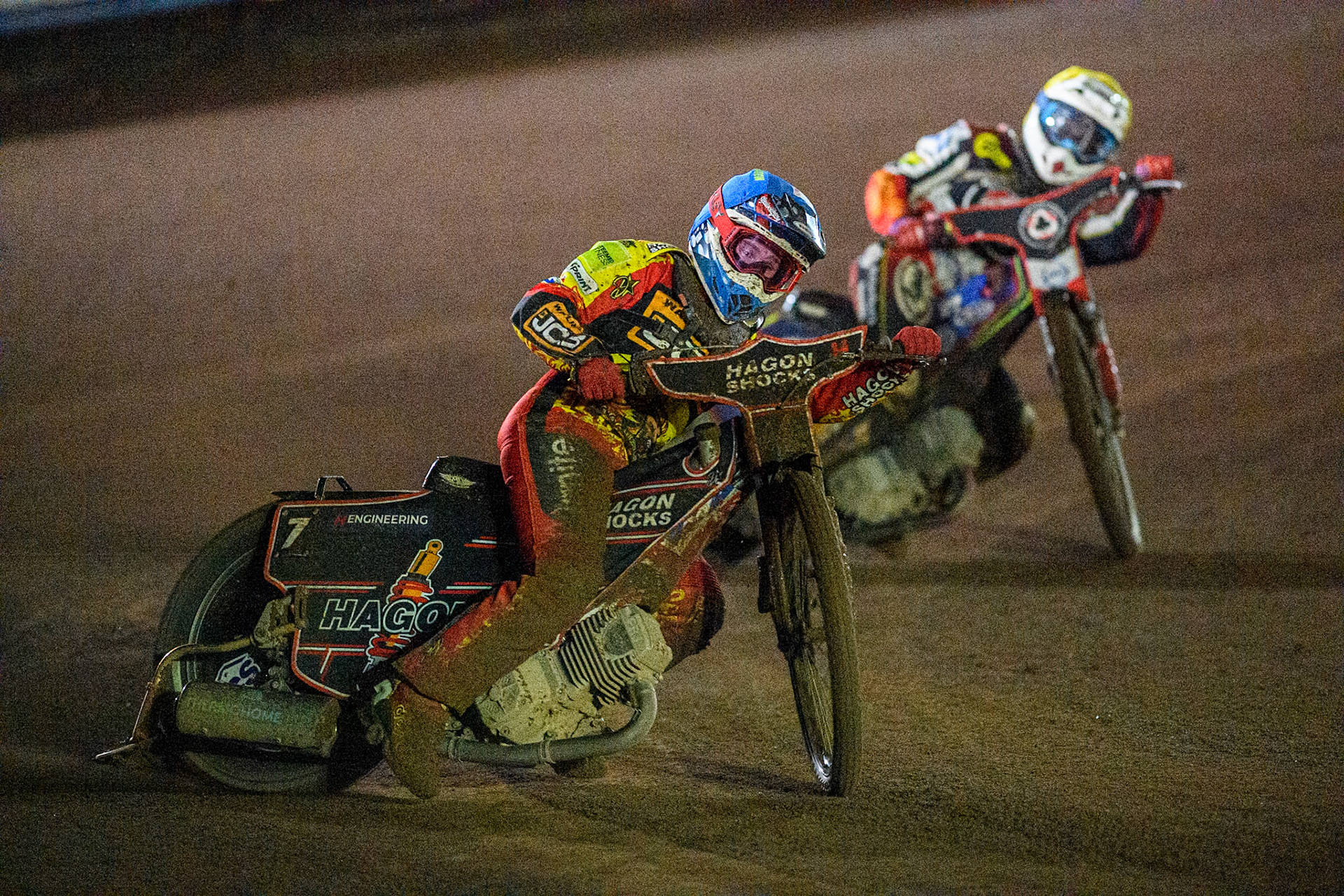 Leicester Lions' Sam Hagon in Blue leading Belle Vue Aces' Jake Mulford in Yellow during the Rowe Motor Oil Premiership Grand Final 2nd Leg between Leicester Lions and Belle Vue Aces at the Pidcock Motorcycles Arena, Leicester on Thursday 26th September 2024. (Photo: Ian Charles | MI News)
