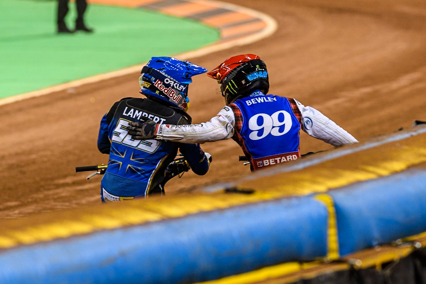 Daniel Bewley (99) of Great Britain in Red celebrates winning the Final with 2nd places Robert Lambert (505) of Great Britain in Blue during the FIM Speedway Grand Prix of Great Britain at The Principality Stadium, Cardiff on Saturday 17th August 2024. (Photo: Ian Charles | MI News)