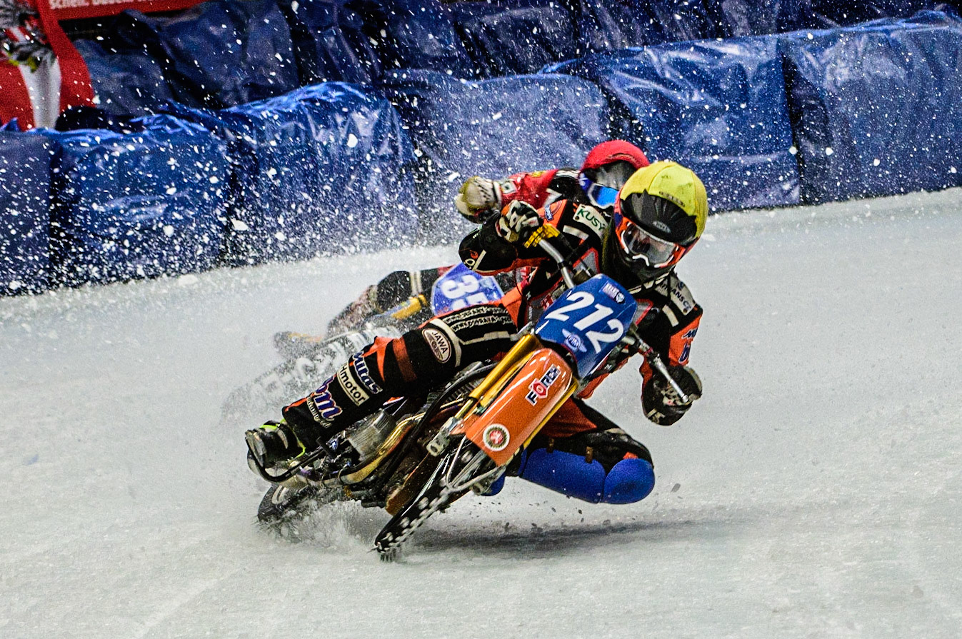 Lukas Hutla (212) (Yellow) picks up ahead of Jo Saetre (357)(Red) during the Ice Speedway Gladiators World Championship Final 1 at Max-Aicher-Arena, Inzell, Germany on Saturday 18th March 2023. (Photo: Ian Charles | MI News)