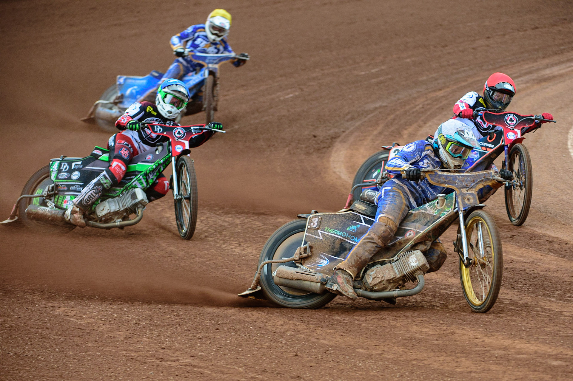 MANCHESTER UK  Richard Lawson  (White) leads Brady Kurtz  (Red) Charles Wright  (Blue) and Lewis Kerr  (Yellow) during the SGB Premiership match between Belle Vue Aces and King's Lynn Stars at the National Speedway Stadium, Manchester on Monday 11th July 2022. (Credit: Ian Charles | MI News)
