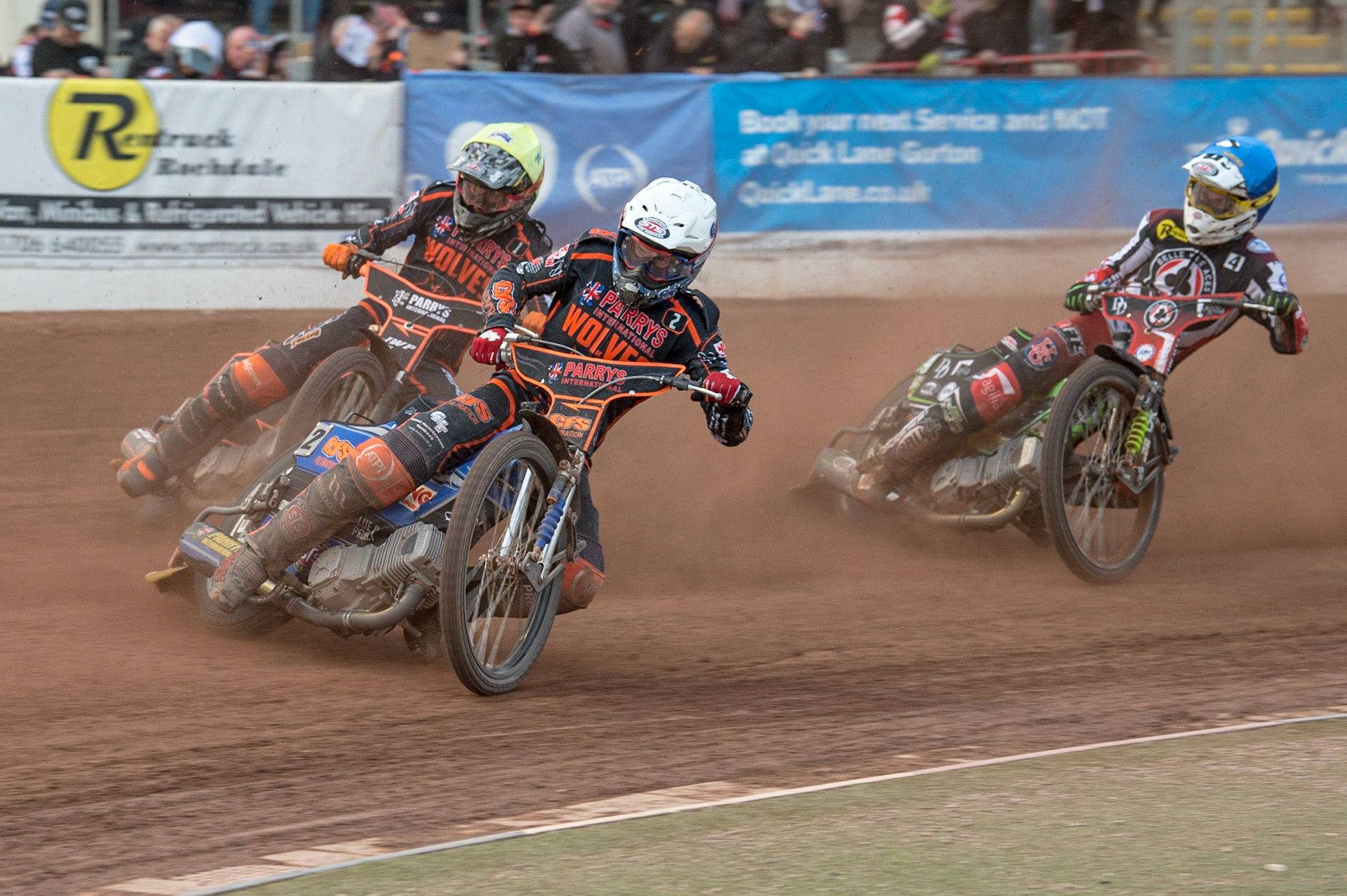 MANCHESTER, UK. JUN 13TH Steve Worrall  (White) and Sam Masters  (Yellow) lead Charles Wright  (Blue) during the SGB Premiership match between Belle Vue Aces and Wolverhampton  Wolves at the National Speedway Stadium, Manchester on Monday 13th June 2022. (Credit: Ian Charles | MI News)