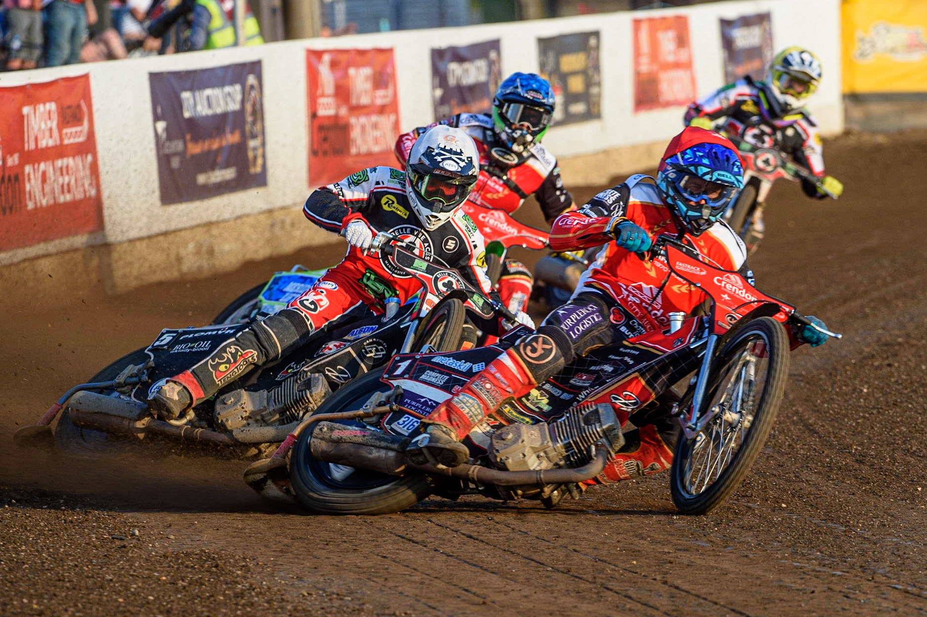 PETERBOROUGH, UK. JULY 19TH  Ulrich Ostergaard  (Red) leads Dan Bewley (White), Hans Andersen  (Blue) and Tom Brennan   (Yellow)during the SGB Premiership match between Peterborough and Belle Vue Aces at East of England Showground, Peterborough on Monday 19th July 2021. (Credit: Ian Charles | MI News)