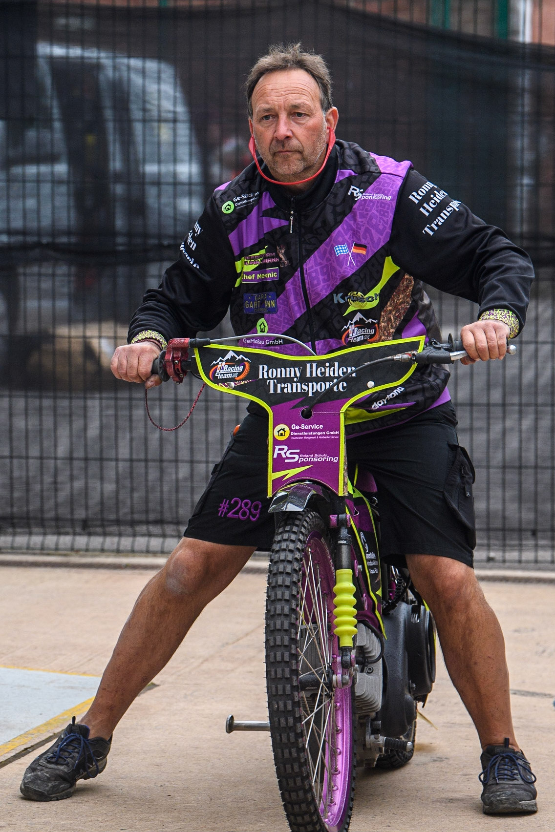 Celina Liebmann’s father Juergen (himself a former rider) starts the spare bike during the FIM Women's  Speedway Academy at the National Speedway Stadium, Manchester on Friday 4th August 2023. (Photo: Ian Charles | MI News)