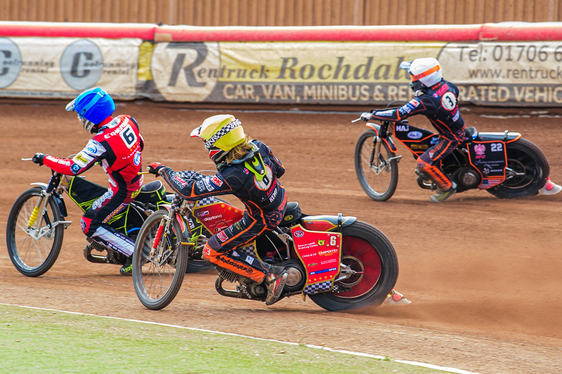 Drew Kemp  (Yellow) chases Jye Etheridge  (Blue) with Luke Becker  (White) on the outside during the SGB Premiership match between Belle Vue Aces and Wolverhampton Wolves at the National Speedway Stadium, Manchester on Monday 29th August 2022. (Credit: Ian Charles | MI News)