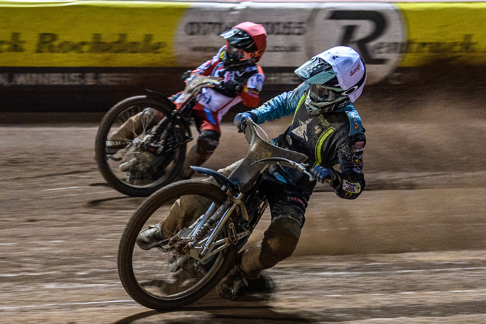 Ipswich Witches' Guest Ryan Douglas in White rides inside Belle Vue Aces' Ben Cook during the Rowe Motor Oil Premiership match between Belle Vue Aces and Ipswich Witches at the National Speedway Stadium, Manchester on Monday 22nd April 2024. (Photo: Ian Charles | MI News)