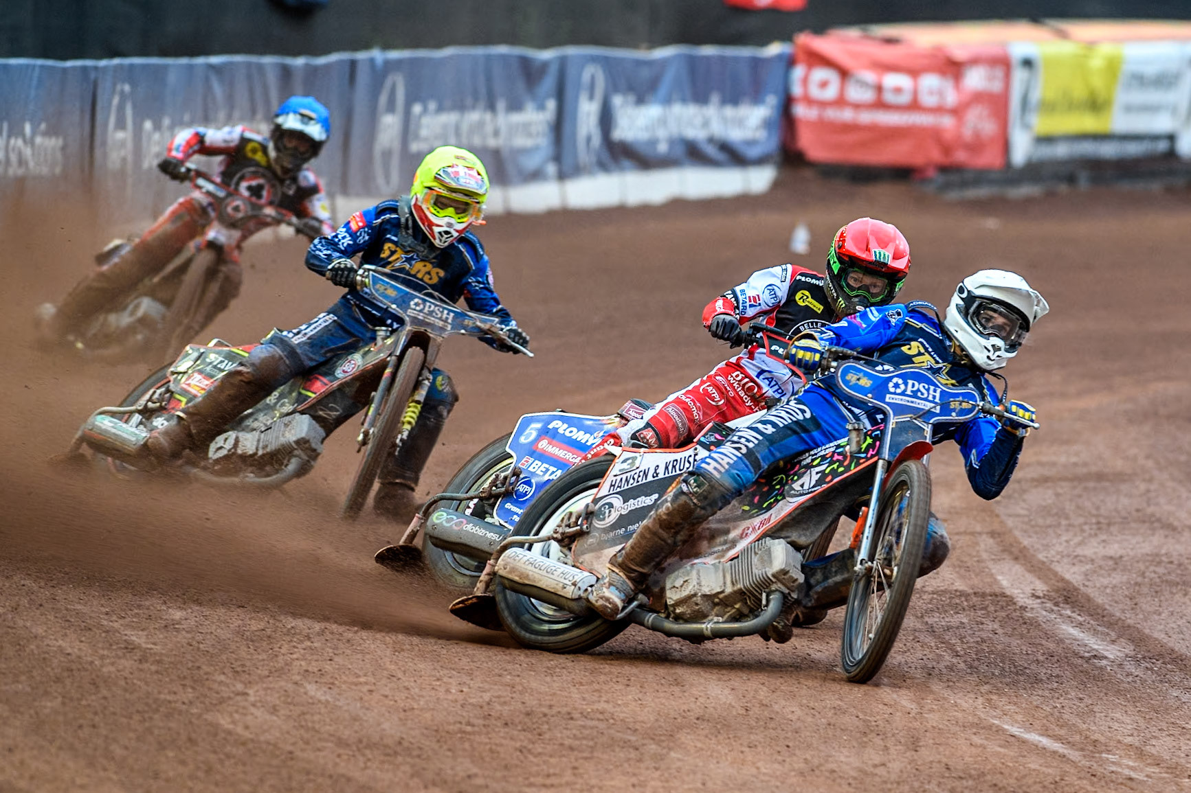 King Lynn Stars' Niels-Kristian Iversen in White leading Belle Vue Aces' Dan Bewley in Red, King Lynn Stars' Michael Palm Toft in Yellow and Belle Vue Aces' Connor Mountain in Blue during the Rowe Motor Oil Premiership match between Belle Vue Aces and King's Lynn Stars at the National Speedway Stadium, Manchester on Monday 20th May 2024. (Photo: Ian Charles | MI News)