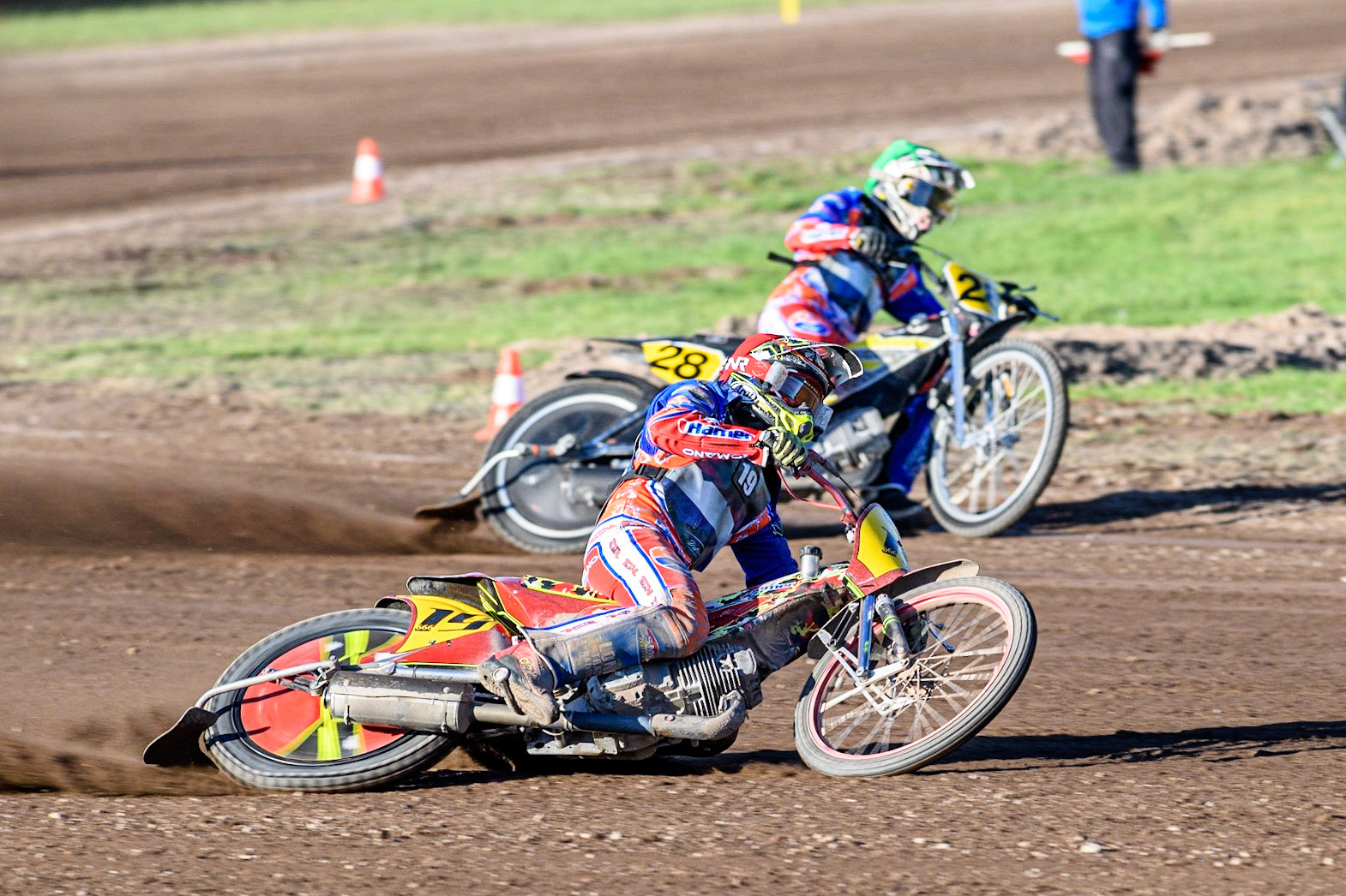Romano Hummel (Red) outside team mate Mika Meijer (Green) during the FIM Long Track Of Nations event at the Speed Centre Roden on Sunday 24th September 2023. (Photo: Ian Charles | MI News)