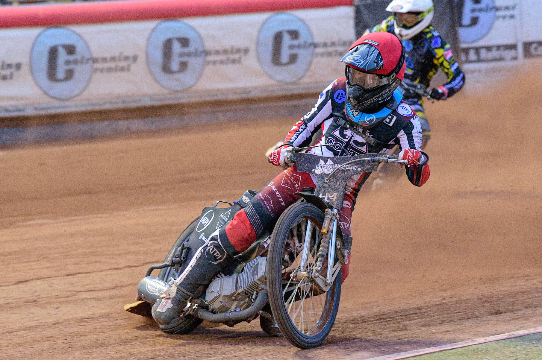 MANCHESTER, UK. JUN 24TH  Harry McGurk  (Red) leads Kyle Bickley  (White) during the National Development League match between Belle Vue Colts and Berwick Bullets at the National Speedway Stadium, Manchester on Friday 24th June 2022. (Credit: Ian Charles | MI News)