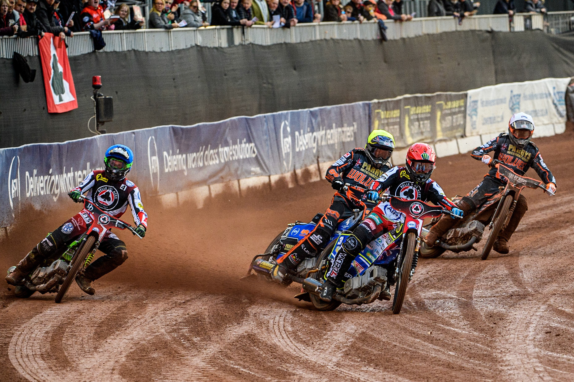 Jaimon Lidsey (Red) leads Sam Masters (White) Steve Worrall (Yellow) and Charles Wright (Blue) during the Sports Insure Premiership Knock Out Cup Quarter Final 2nd Leg between Belle Vue Aces and Wolverhampton Wolves at the National Speedway Stadium, Manchester on Thursday 18th May 2023. (Photo: Ian Charles | MI News)