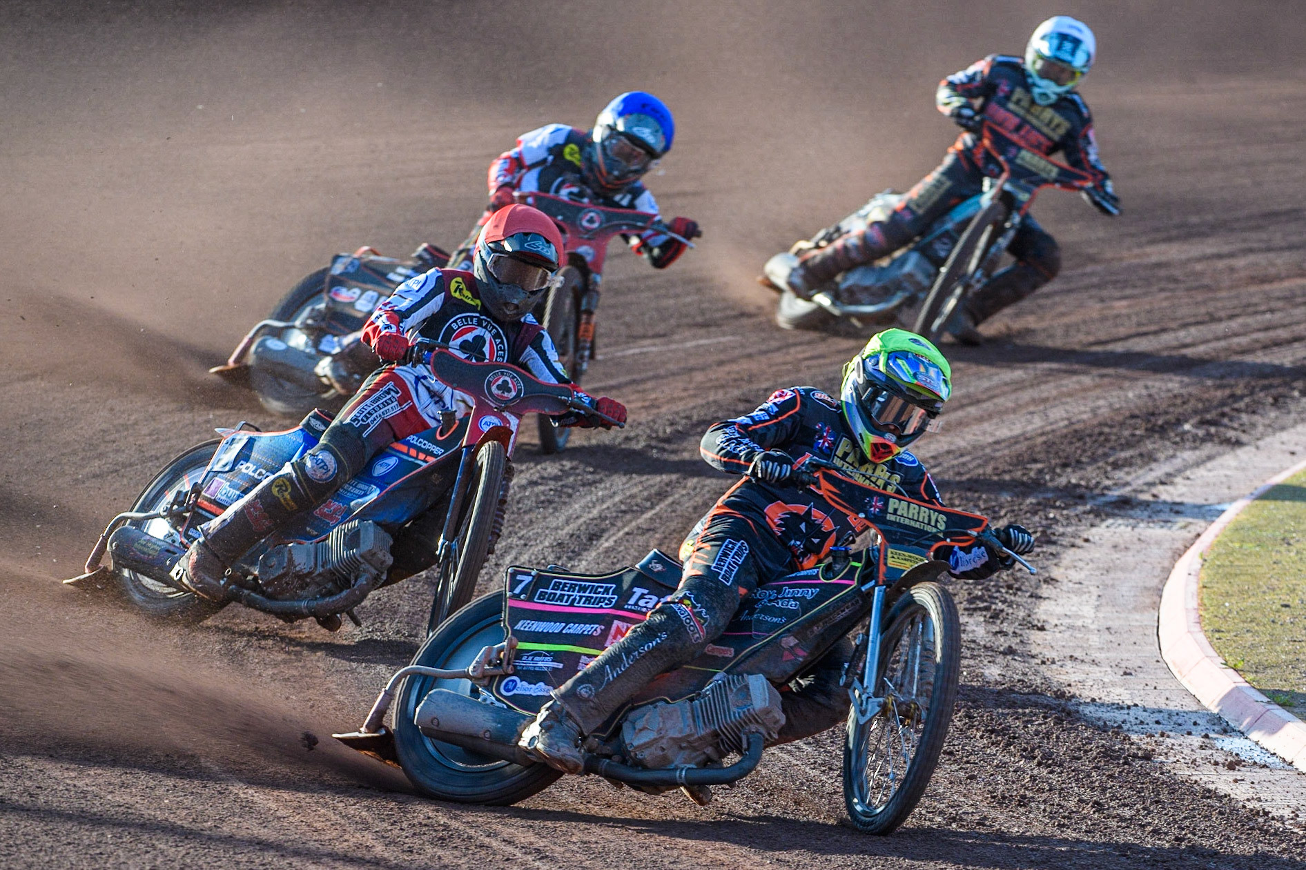 Leon Flint (Yellow) leads Brady Kurtz (Red), Jack Smith (Blue) and Ryan Douglas (White) during the Sports Insure Premiership match between Belle Vue Aces and Wolverhampton Wolves at the National Speedway Stadium, Manchester on Monday 3rd July 2023. (Photo: Ian Charles | MI News)