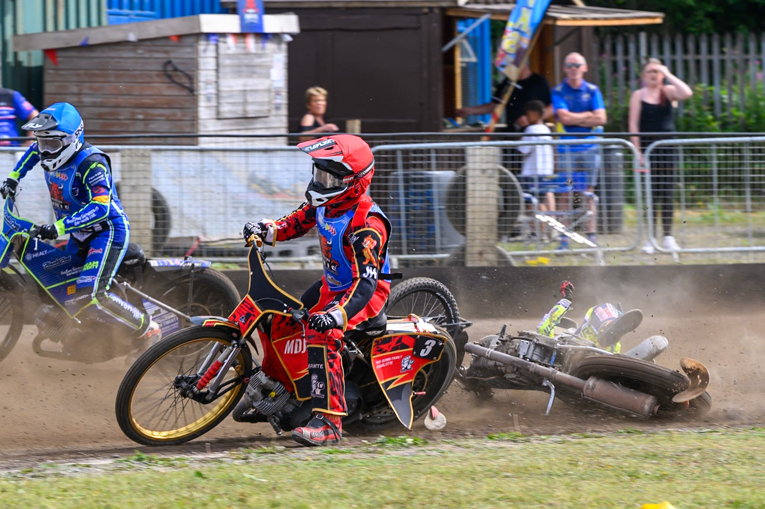In the re-run of Heat 5, Darryl Ritchings of Oxford Chargers  falls behind Luke Harris of Buxton Bulls in Red  during the WSRA National Development League match between Buxton Bulls and Oxford Chargers at Hi-Edge Speedway, Buxton on Sunday 2nd August 2026. (Photo: Ian Charles | MI News)