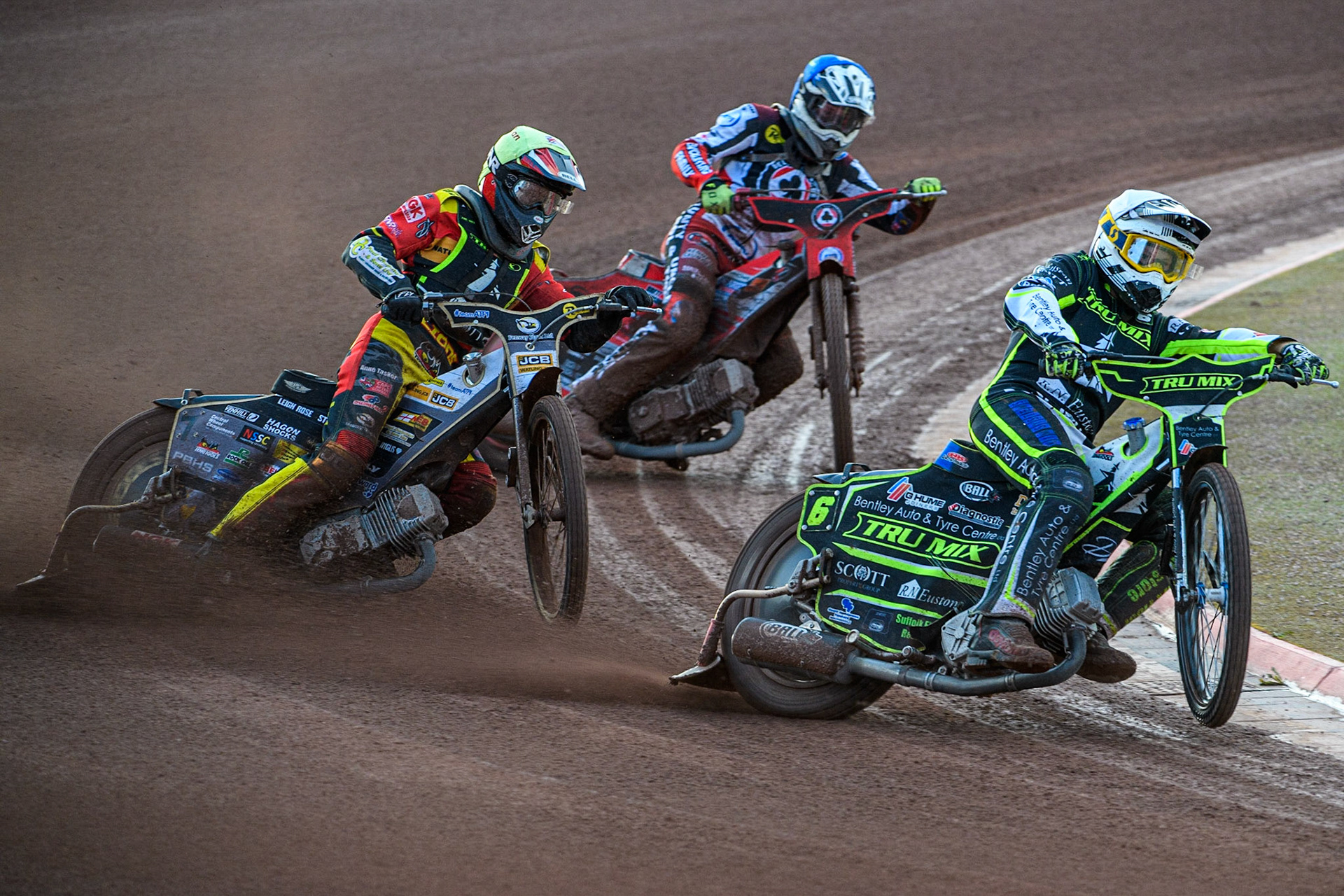 Danyon Hume (White) leads Dan Thompson (Yellow) and Connor Bailey (Blue) during the Sports Insure Premiership match between Belle Vue Aces and Ipswich Witches at the National Speedway Stadium, Manchester on Monday 17th July 2023. (Photo: Ian Charles | MI News)