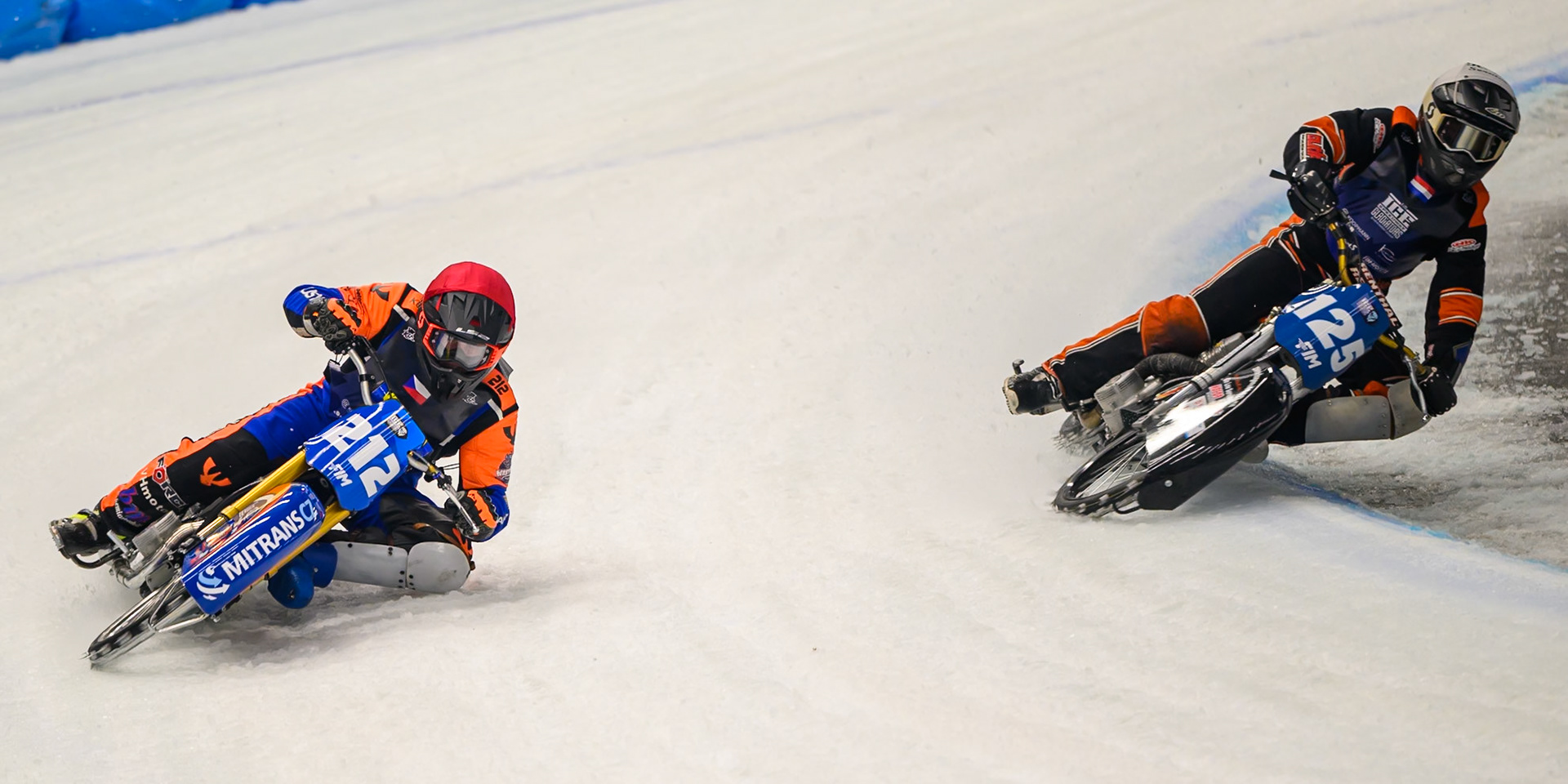 Sebastian Reitsma (125) of The Netherlands in White rides inside Lukas Hutla (212) of Czechia  in Red during the Ice Speedway Gladiators World Championship Final 1 at Max-Aicher-Arena, Inzell on Saturday 14th March 2026. (Photo: Ian Charles | MI News)