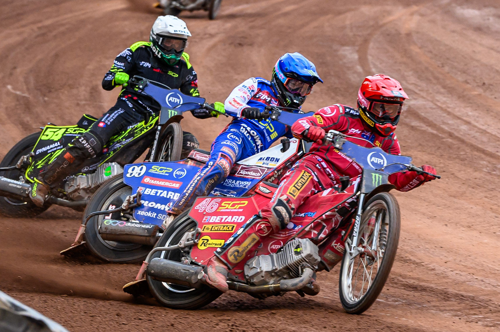 Max Fricke (46) of Australia in Red leading Dan Bewley (99) of Great Britain in Blue and Martin Vaculik (54) of Slovakia in White during the ATPI FIM Speedway Grand Prix Round 4 at the National Speedway Stadium, Manchester, on Friday 13th June 2025. (Photo: Ian Charles | MI News)