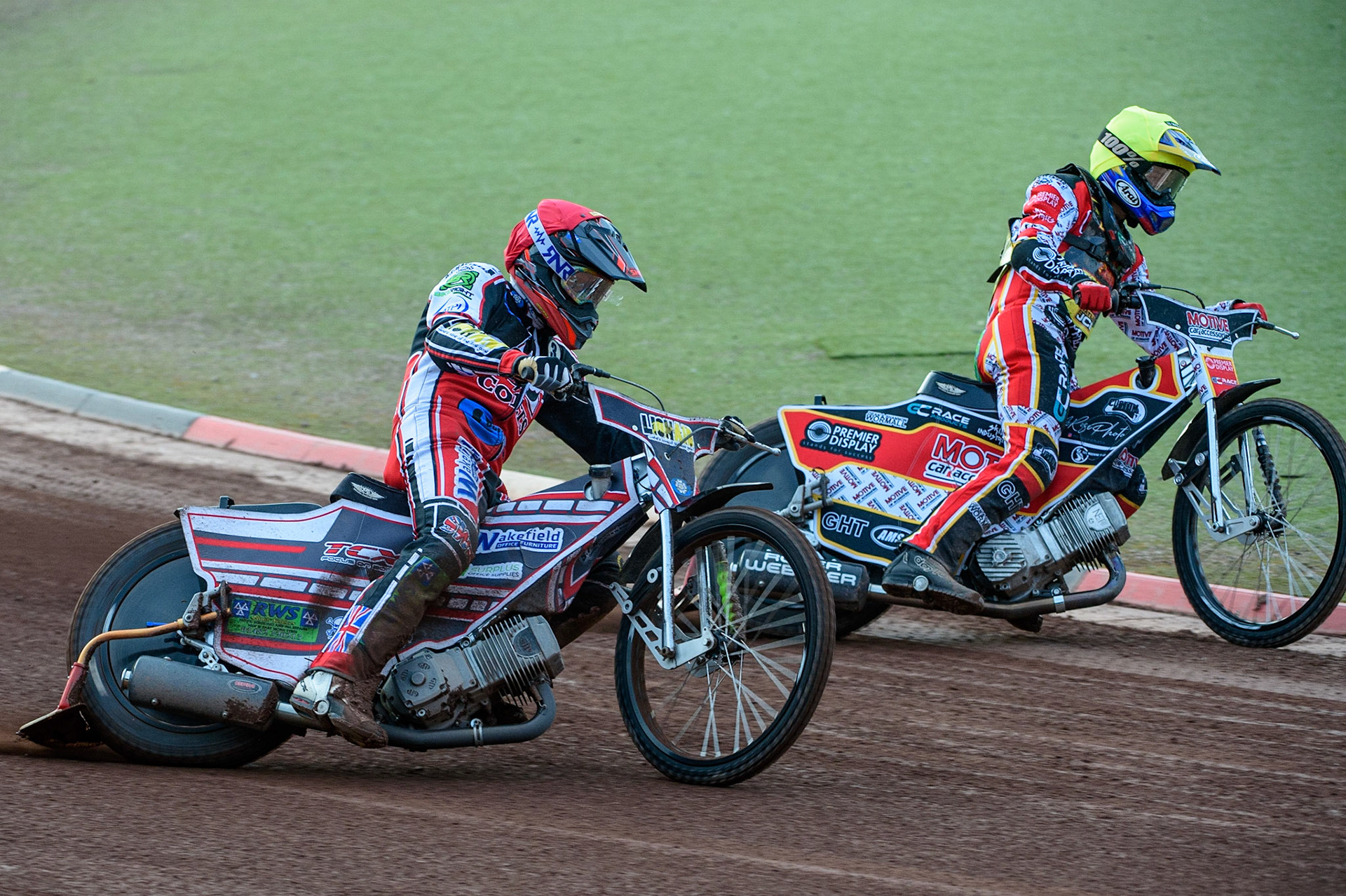 MANCHESTER, UK. JULY 29TH  Jack Parkinson-Blackburn (Red) goes wide to pass Tom Spencer   (Yellow)  during the National Development League match between Belle Vue Colts and Leicester Lion Cubs at the National Speedway Stadium, Manchester on Thursday 29th July 2021. (Credit: Ian Charles | MI News)