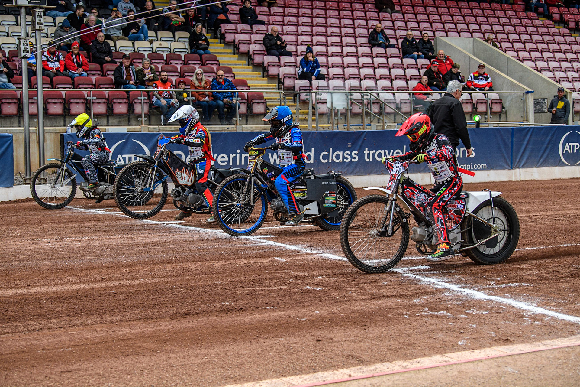 (l - r) Casper Kluczniak (Yellow), Harry Fletcher  (White), Oliver Binns  (Blue) and Charlie Luckman  (Red) leave the start during the British Youth Championships at the National Speedway Stadium, Manchester on Friday 12th May 2023. (Photo: Ian Charles | MI News)