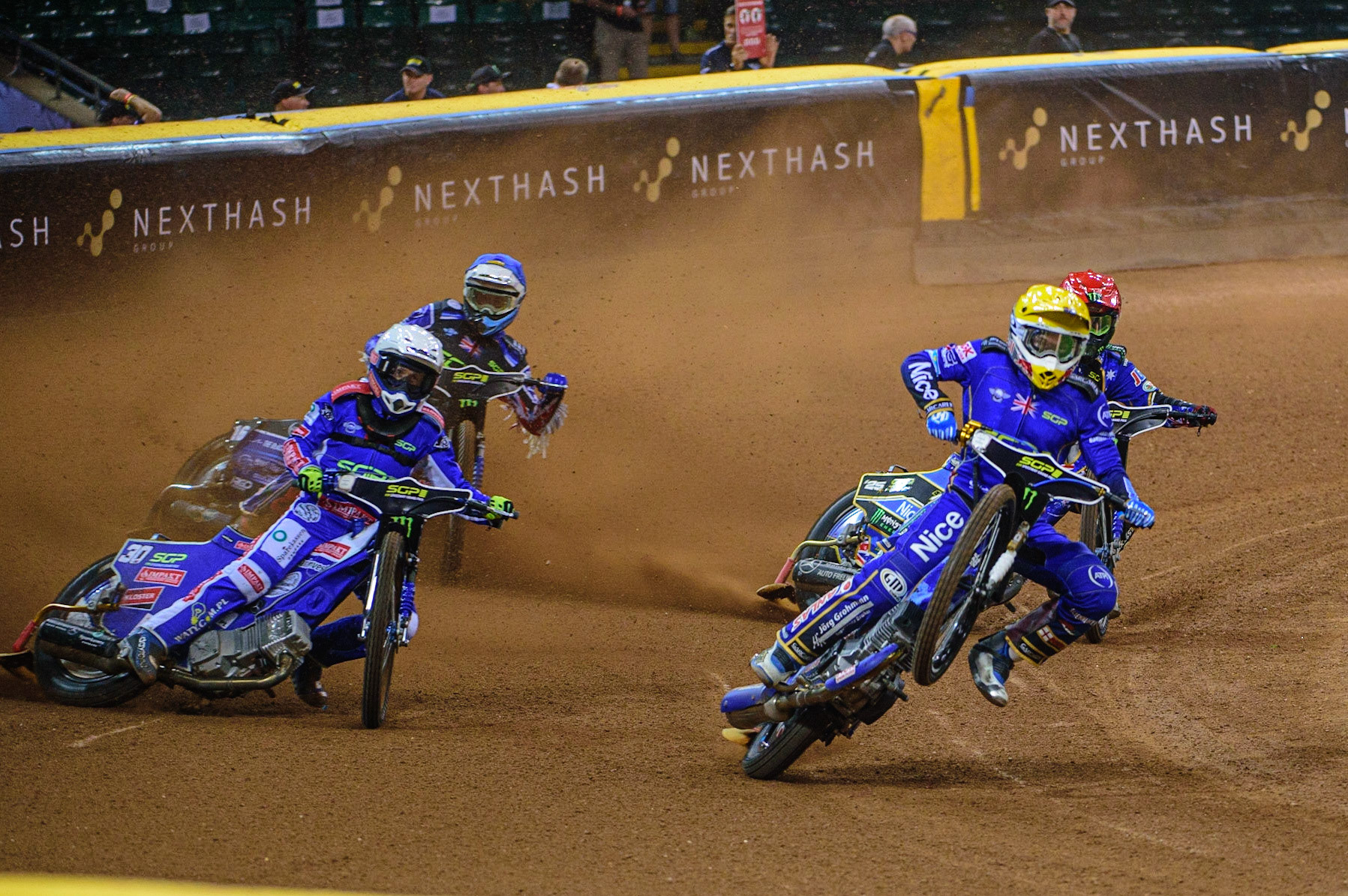 Robert Lambert (505) (Yellow) picks up some drive ahead of Jack Holder (25) (Red), Leon Madsen (30) (White) and Adam Ellis (16) (Blue) during the FIM  Speedway Grand Prix of Great Britain at the Principality Stadium, Cardiff on Saturday 13th August 2022. (Credit: Ian Charles | MI News