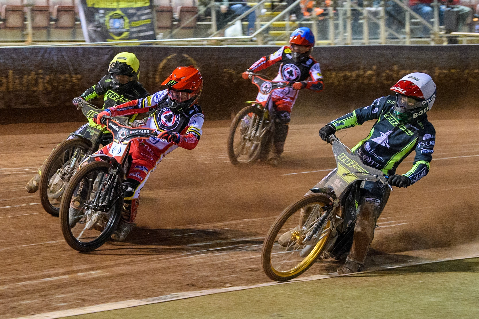Brady Kurtz of Belle Vue Aces in Red leading Adam Ellis of Ipswich Witches, Tom Brennan of Ipswich Witches in Yellow and Tate Zischke of Belle Vue Aces  in Blue during the Premiership Cup Quarter Final 1st Leg match between Belle Vue Aces and Ipswich Witches at the National Speedway Stadium, Manchester on Monday 24th March 2025. (Photo: Ian Charles | MI News)