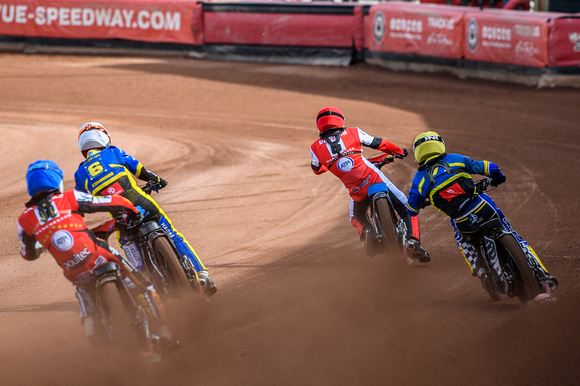 Belle Vue Aces' Jake Mulford  in Blue chases Sheffield Tigers' Jason Edwards  in White, Sheffield Tigers' Guest Rider Joe Thompson  in Yellow and Belle Vue Aces' Antti Vuolas in Red during the Rowe Motor Oil Premiership match between Belle Vue Aces and Sheffield Tigers at the National Speedway Stadium, Manchester on Monday 26th August 2024. (Photo: Ian Charles | MI News)