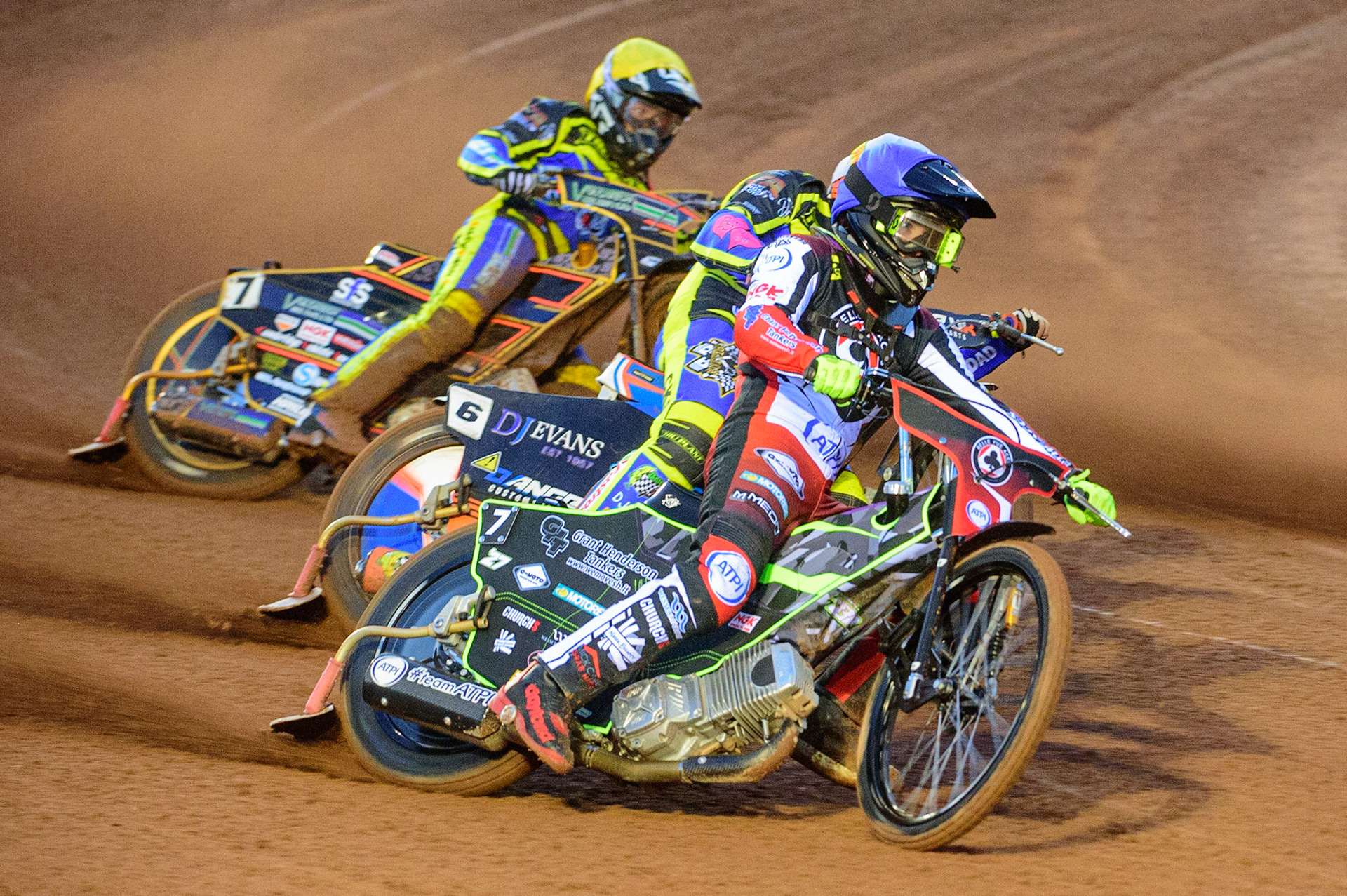 MANCHESTER, UK.  MAR 28TH.  Tom Brennan of Belle Vue leads Stefan Nielsen of Sheffield  (White) and Connor Mountain of Sheffield (Yellow) during the SGB Premiership League Cup match between Belle Vue Aces and Sheffield Tigers at the National Speedway Stadium, Manchester on Monday 28th March 2022. (Credit: Ian Charles | MI News)